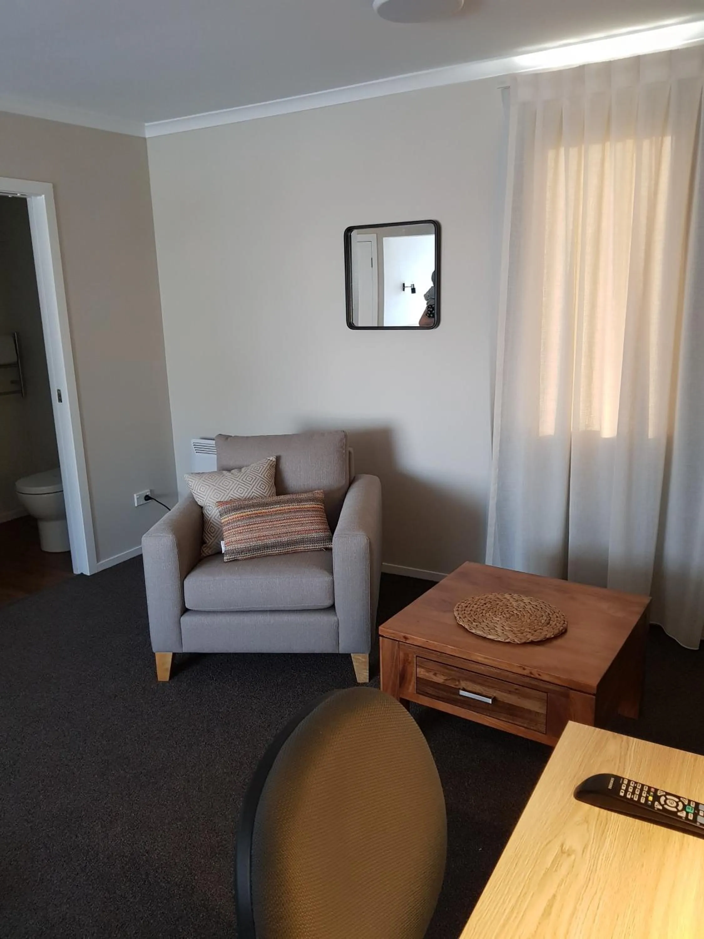 Communal lounge/ TV room in Carramar Motor Inn