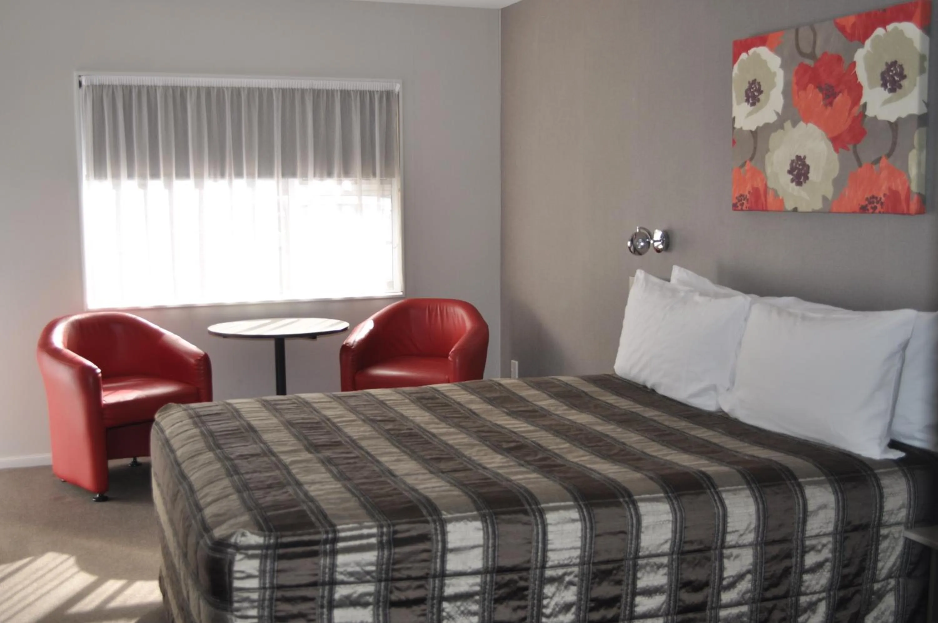 Bed in Carramar Motor Inn