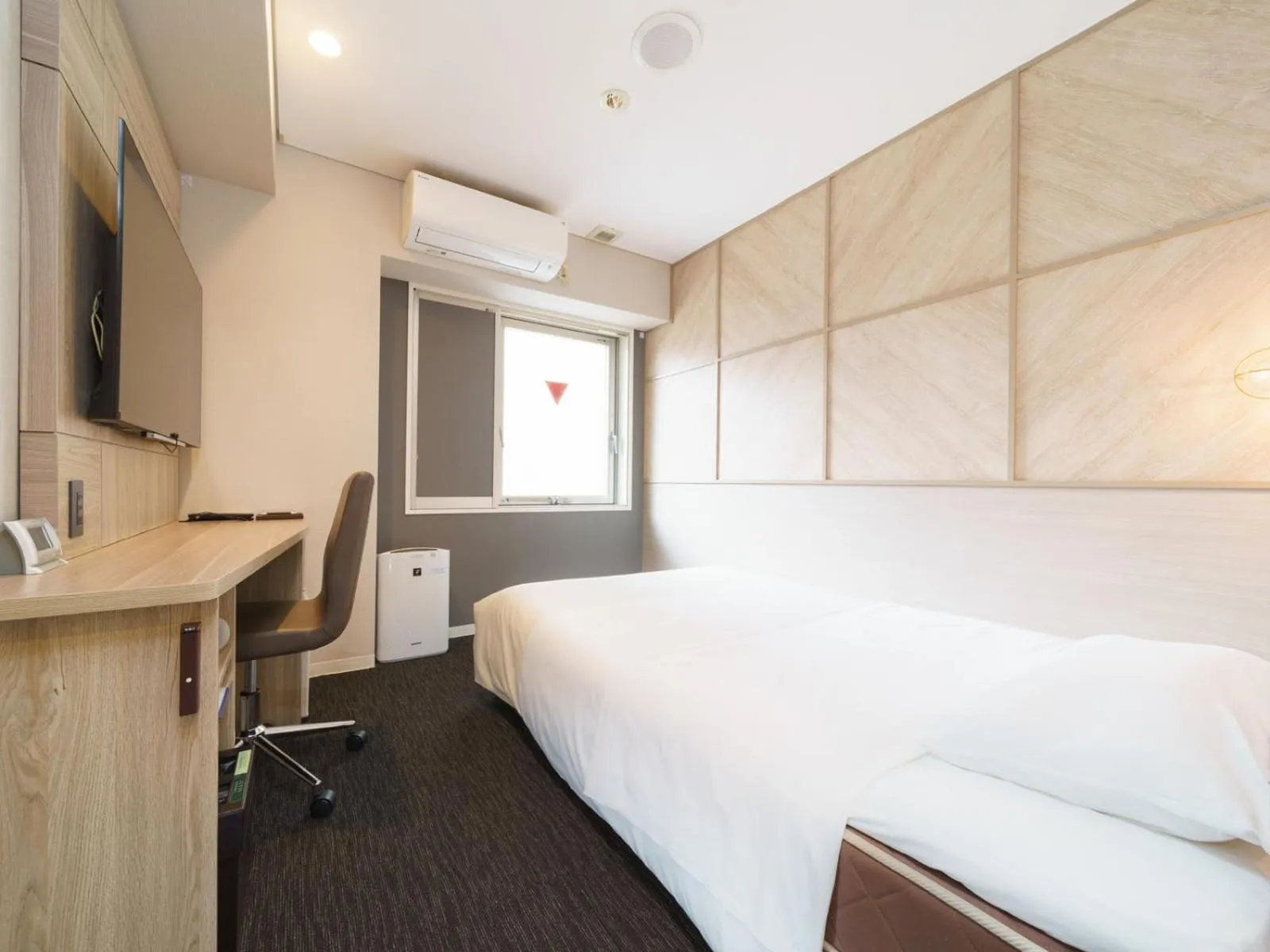 Bed in Super Hotel Midosujisen Esaka