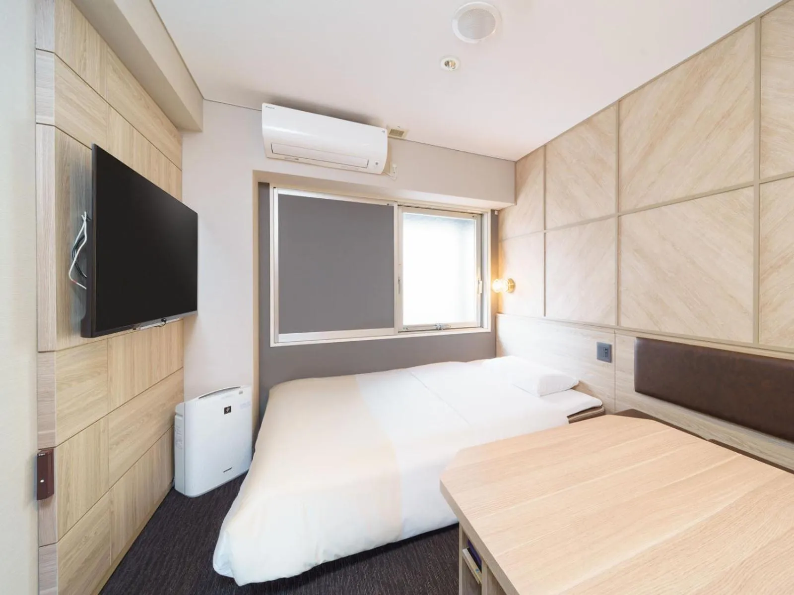 Bed in Super Hotel Midosujisen Esaka