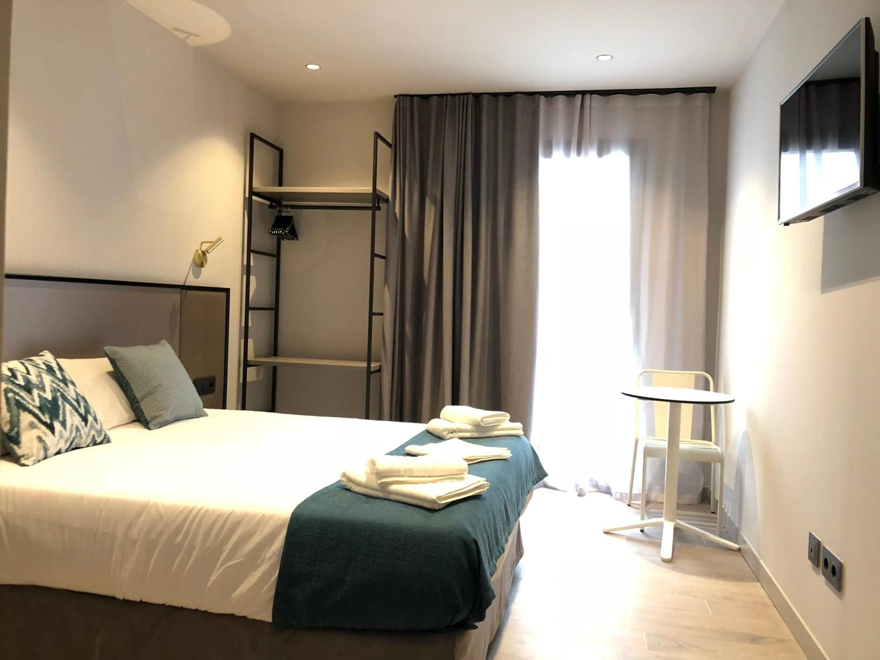 Bed in HOTEL TORRENT