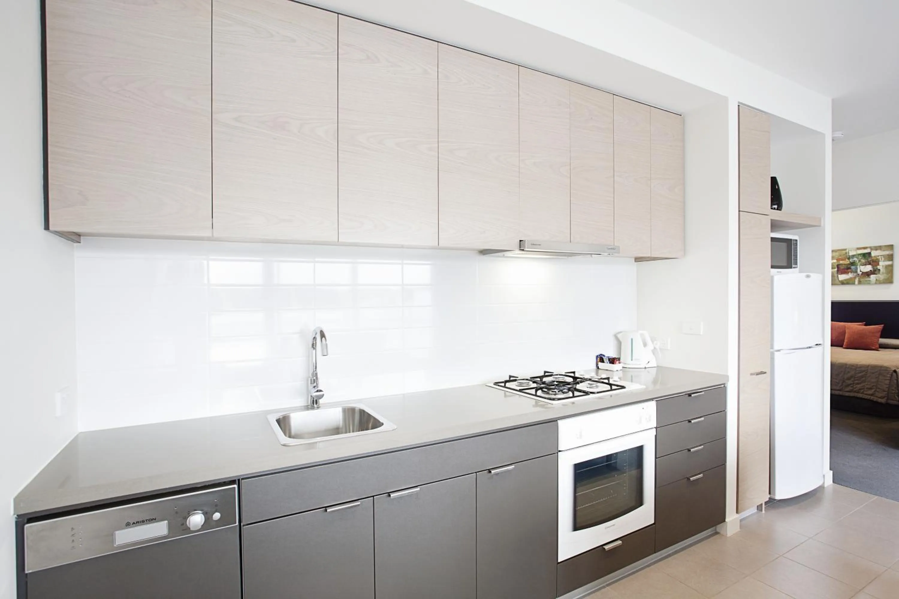Kitchen or kitchenette in St Kilda Central Apartments