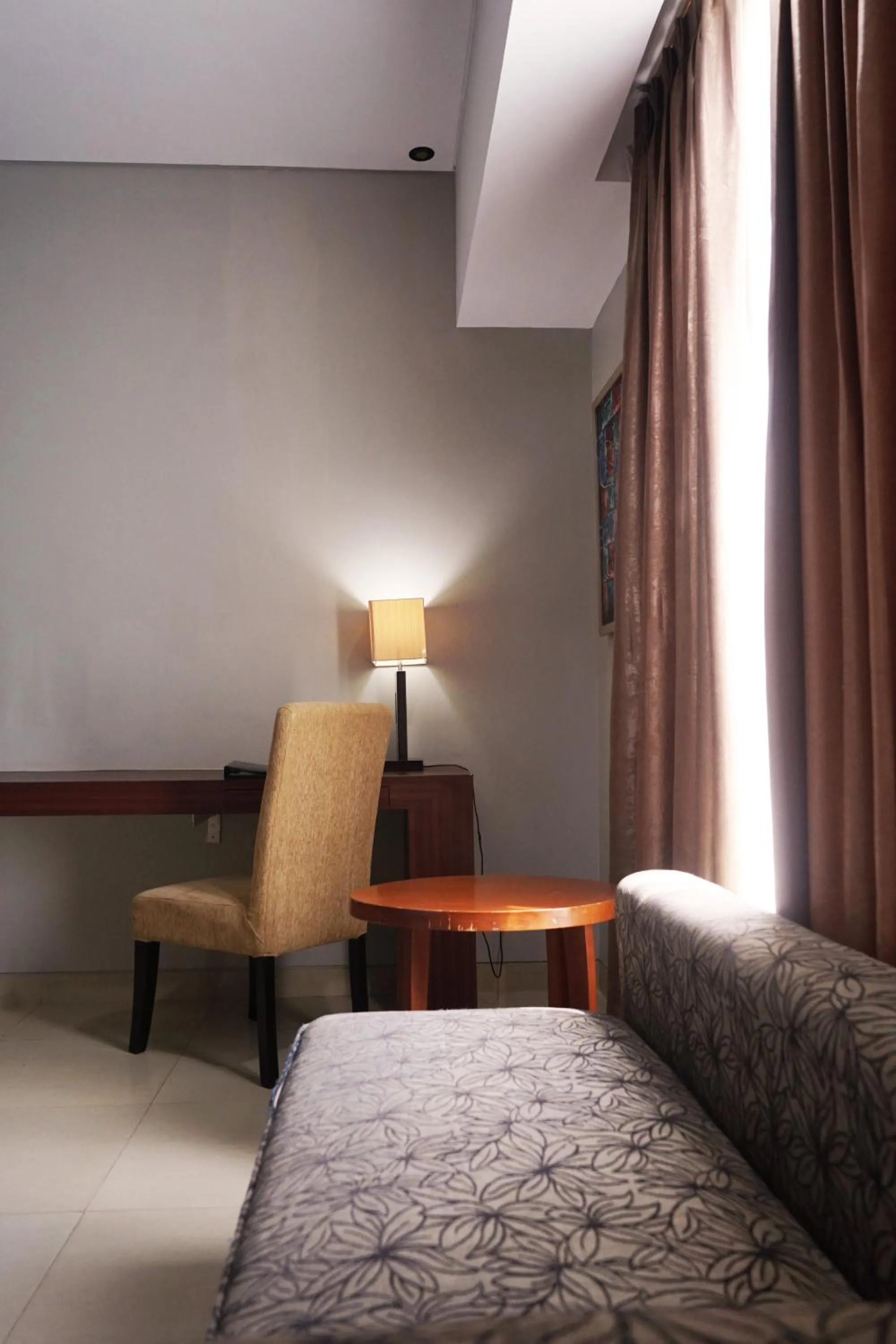 Seating area, Bed in Grand Hatika Hotel