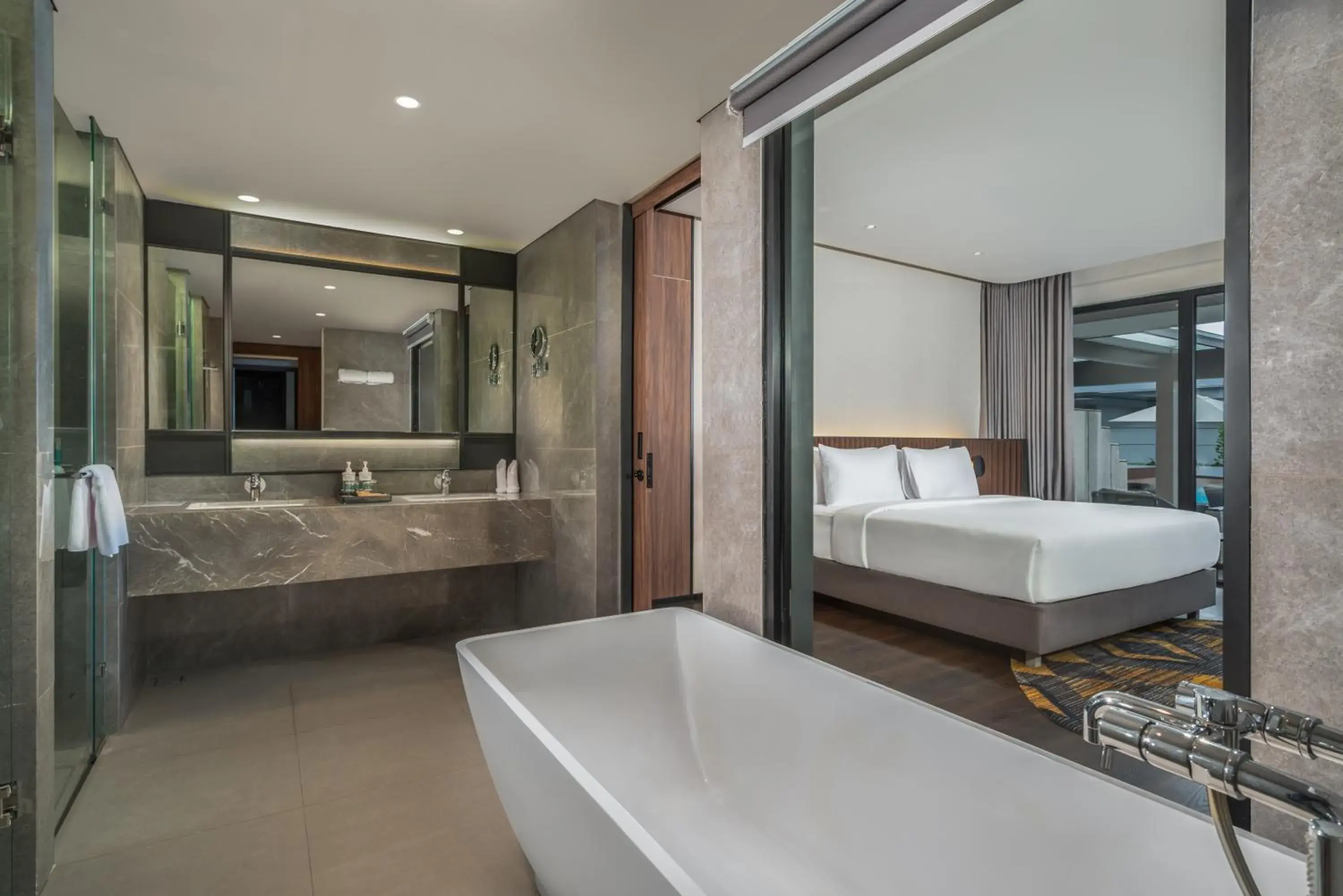 Double Suite with Sofa Bed and Pool View in Novotel Pontianak Convention Centre Double Suite with Sofa Bed and Pool View in Novotel Pontianak Convention Centre