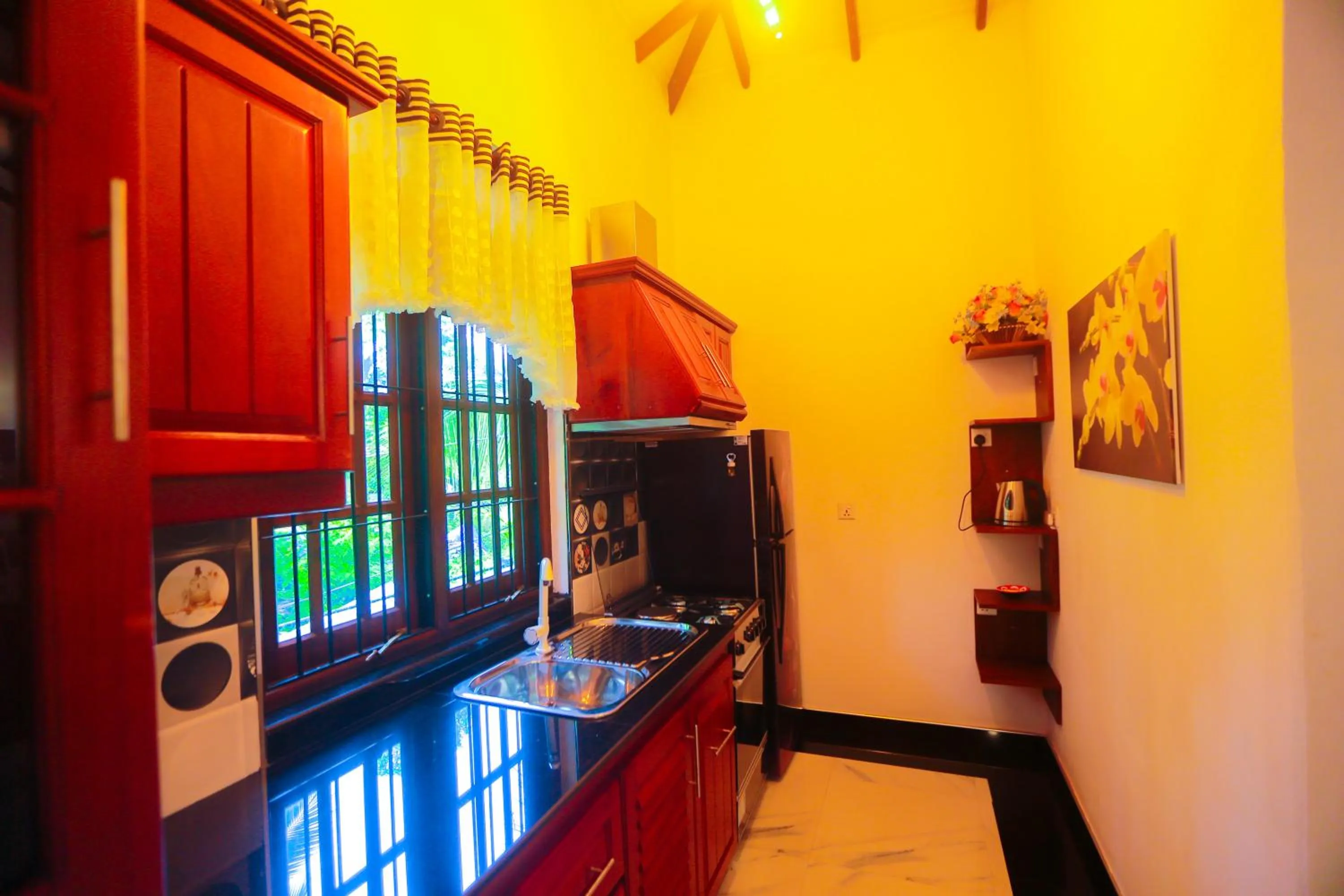 Kitchen or kitchenette in SRI LANKAN VILLA