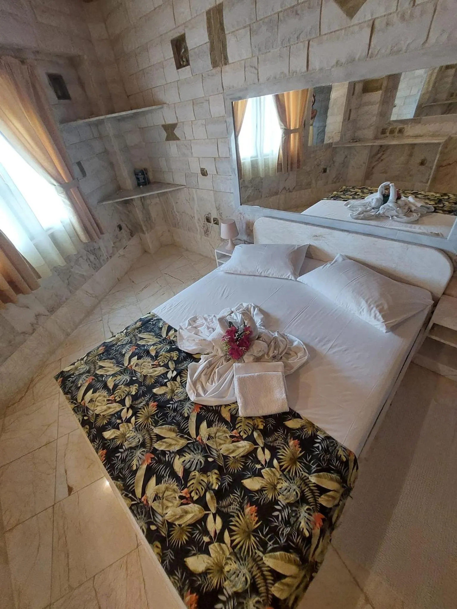 Bed in Paco's Resort Holiday Flats