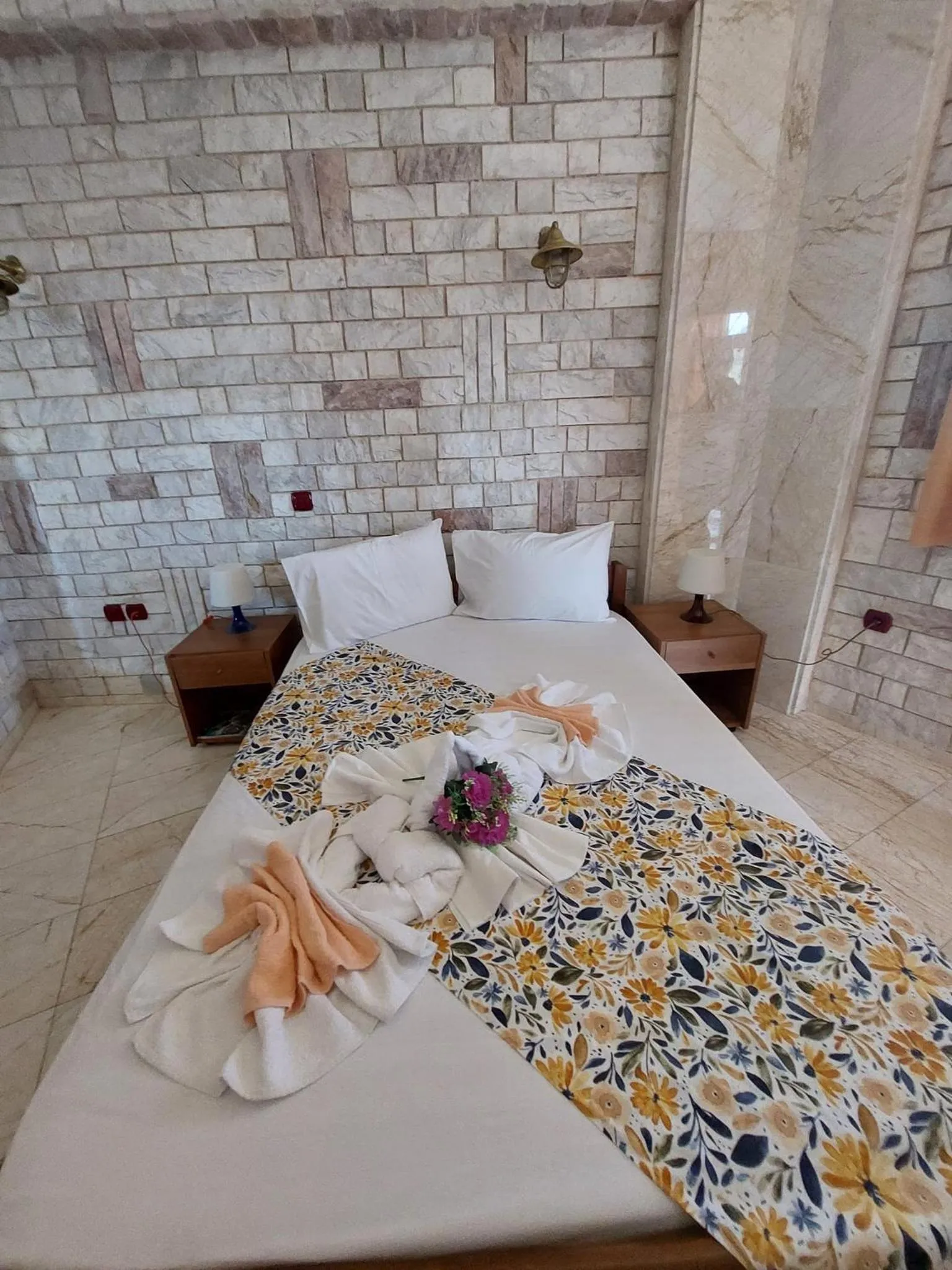 Bed in Paco's Resort Holiday Flats