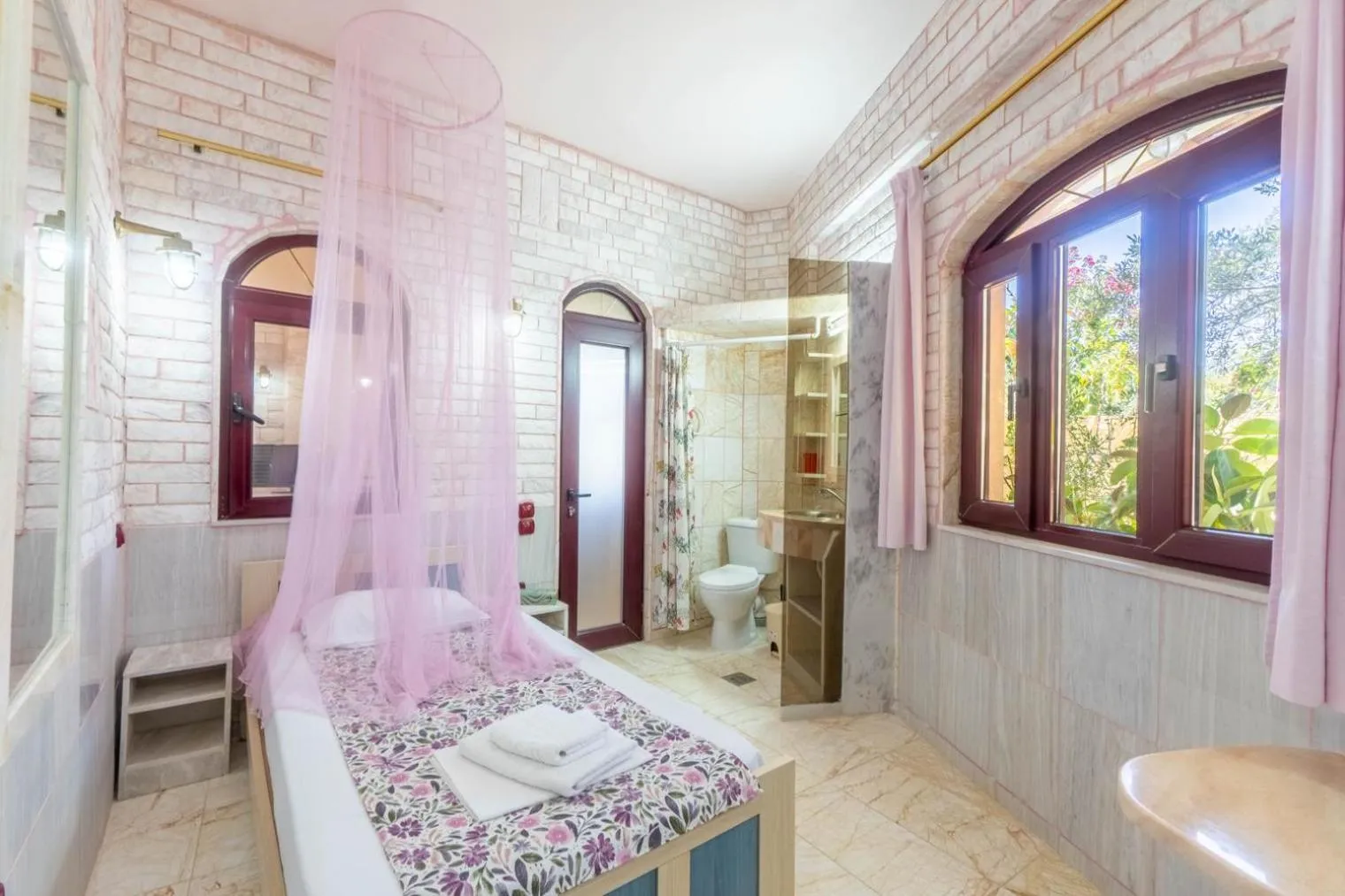 Bed in Paco's Resort Holiday Flats