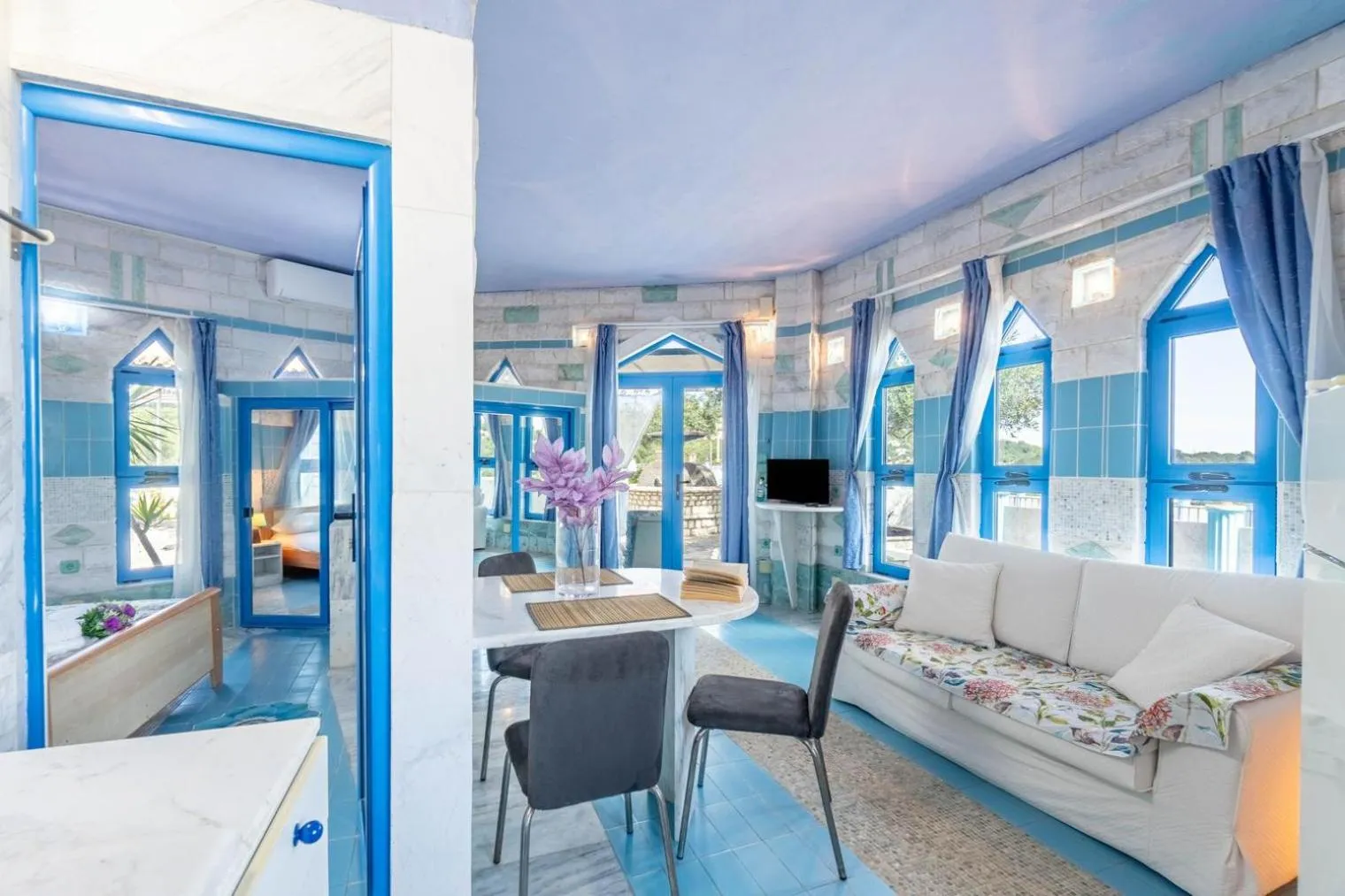 Bed in Paco's Resort Holiday Flats