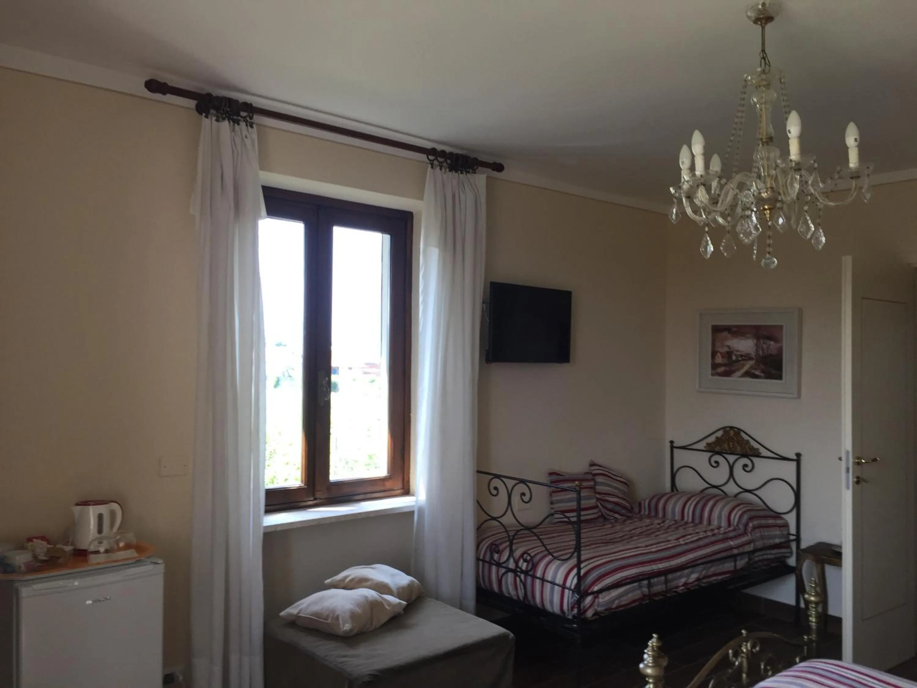 Bed in VILLA LE ROSE