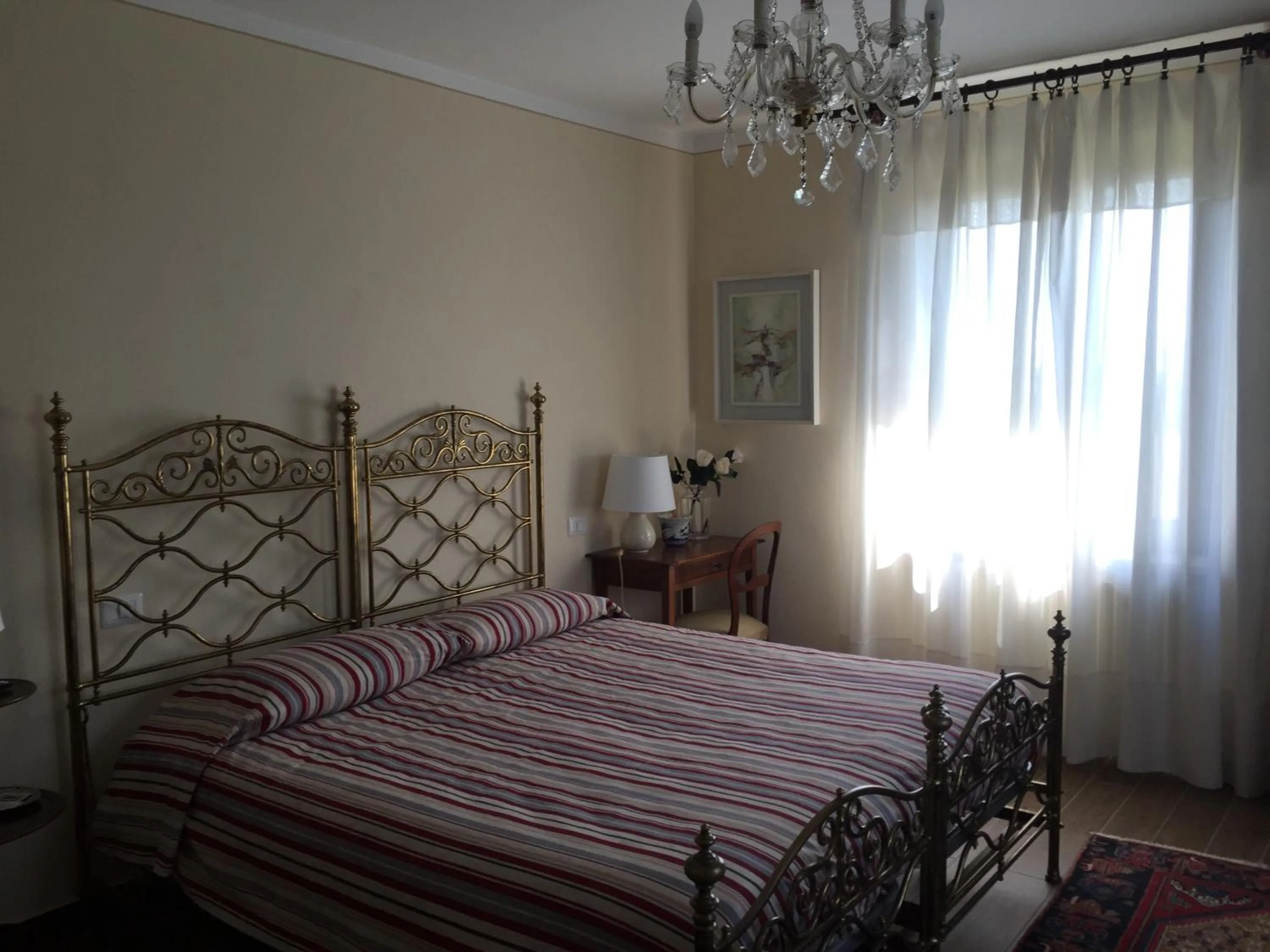Bed in VILLA LE ROSE