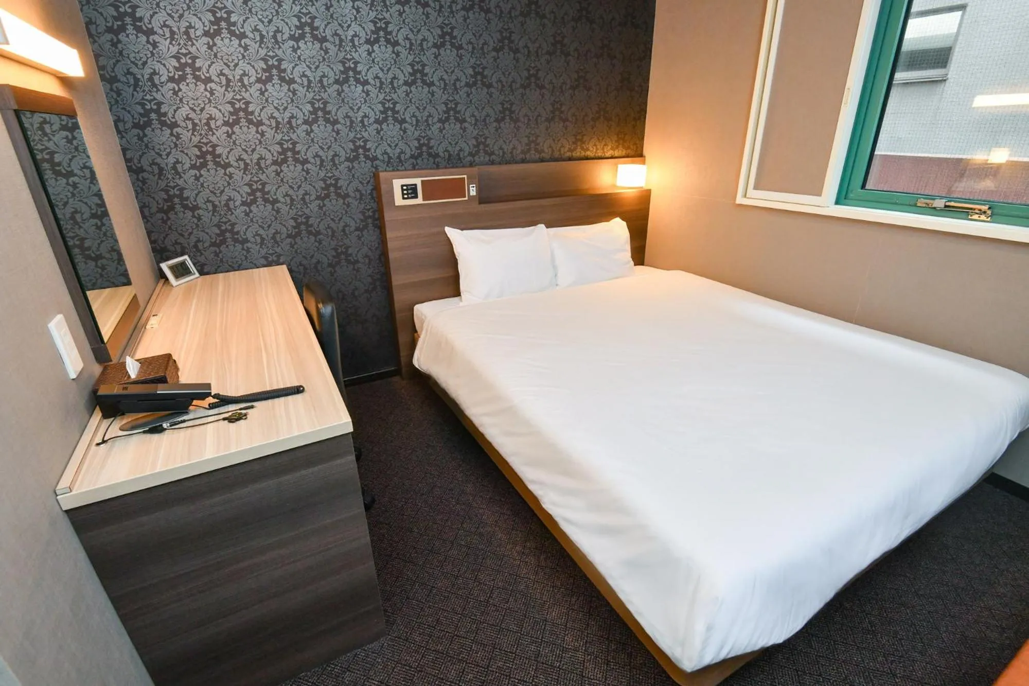 Photo of the whole room, Bed in Sanco Inn Nagoya - Shinkansenguchi