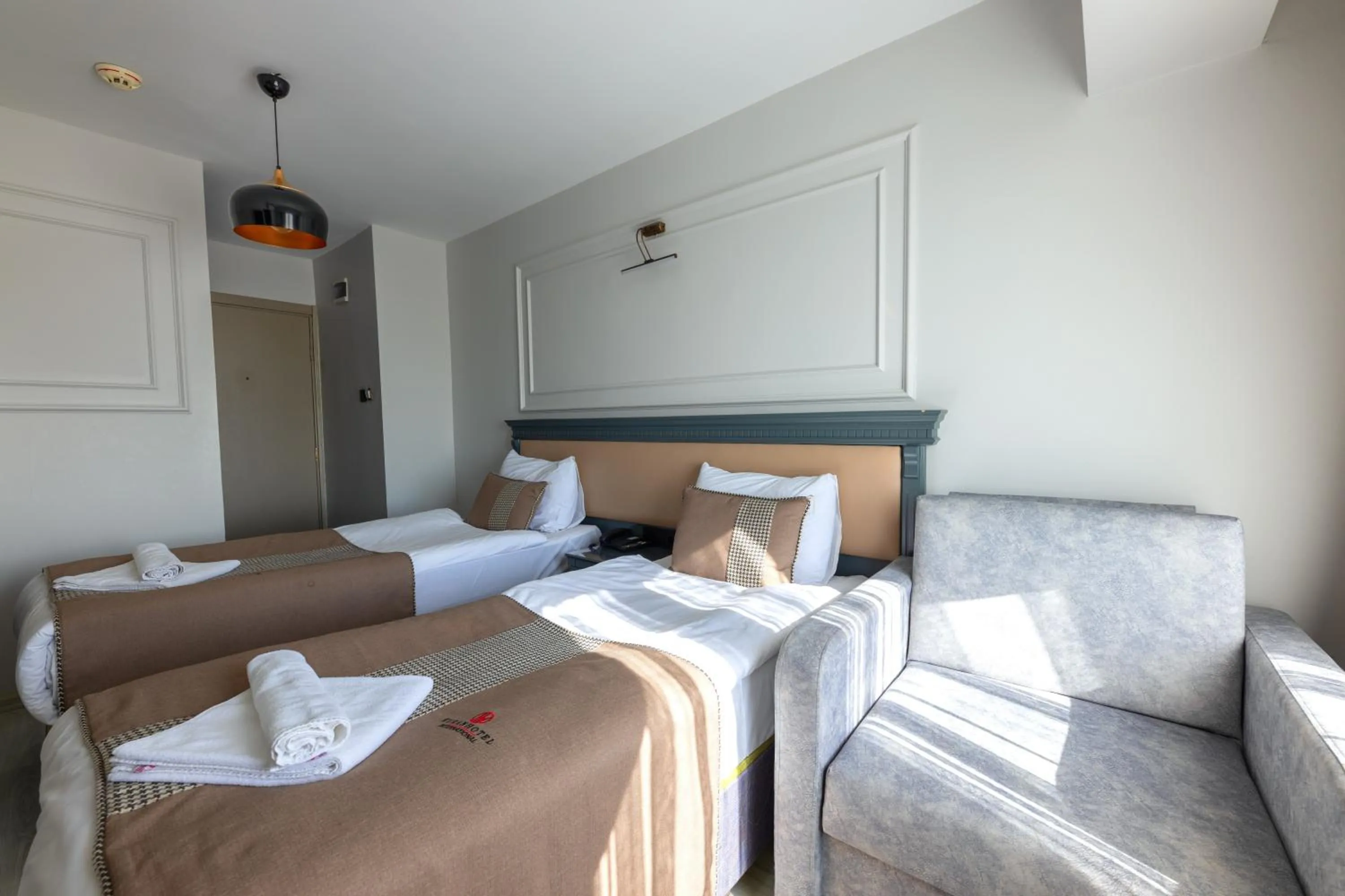 Bed in Kuran Hotel International