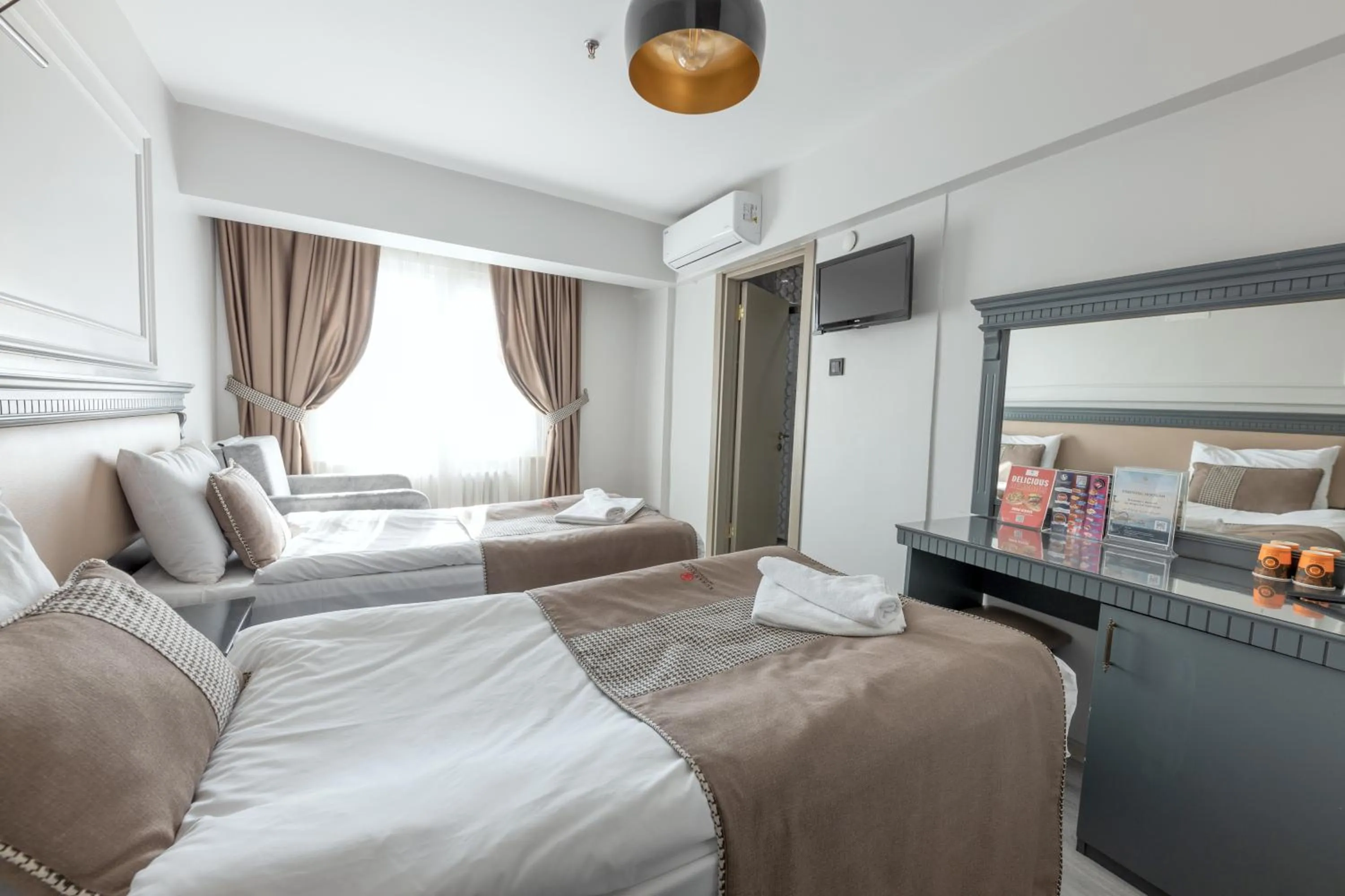 Bed in Kuran Hotel International