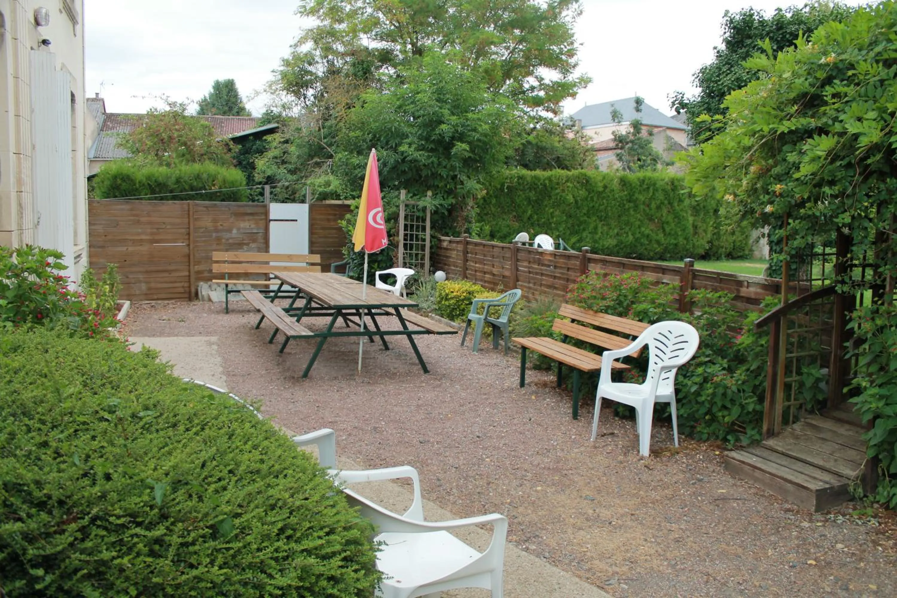 Garden in Logis Hôtel Beauséjour