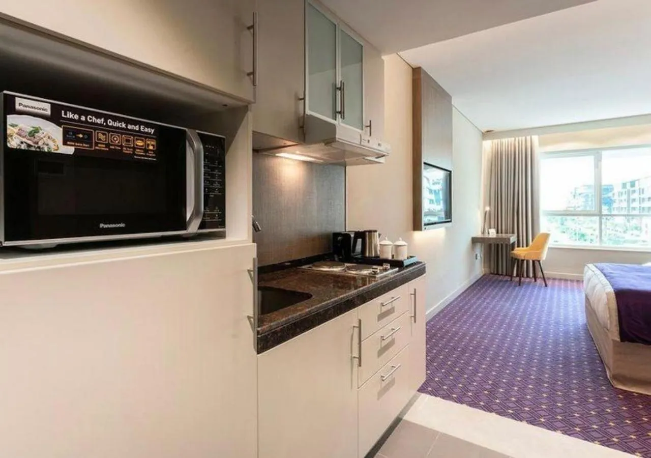 Kitchen or kitchenette in Leva Hotel and Suites, Opposite Downtown