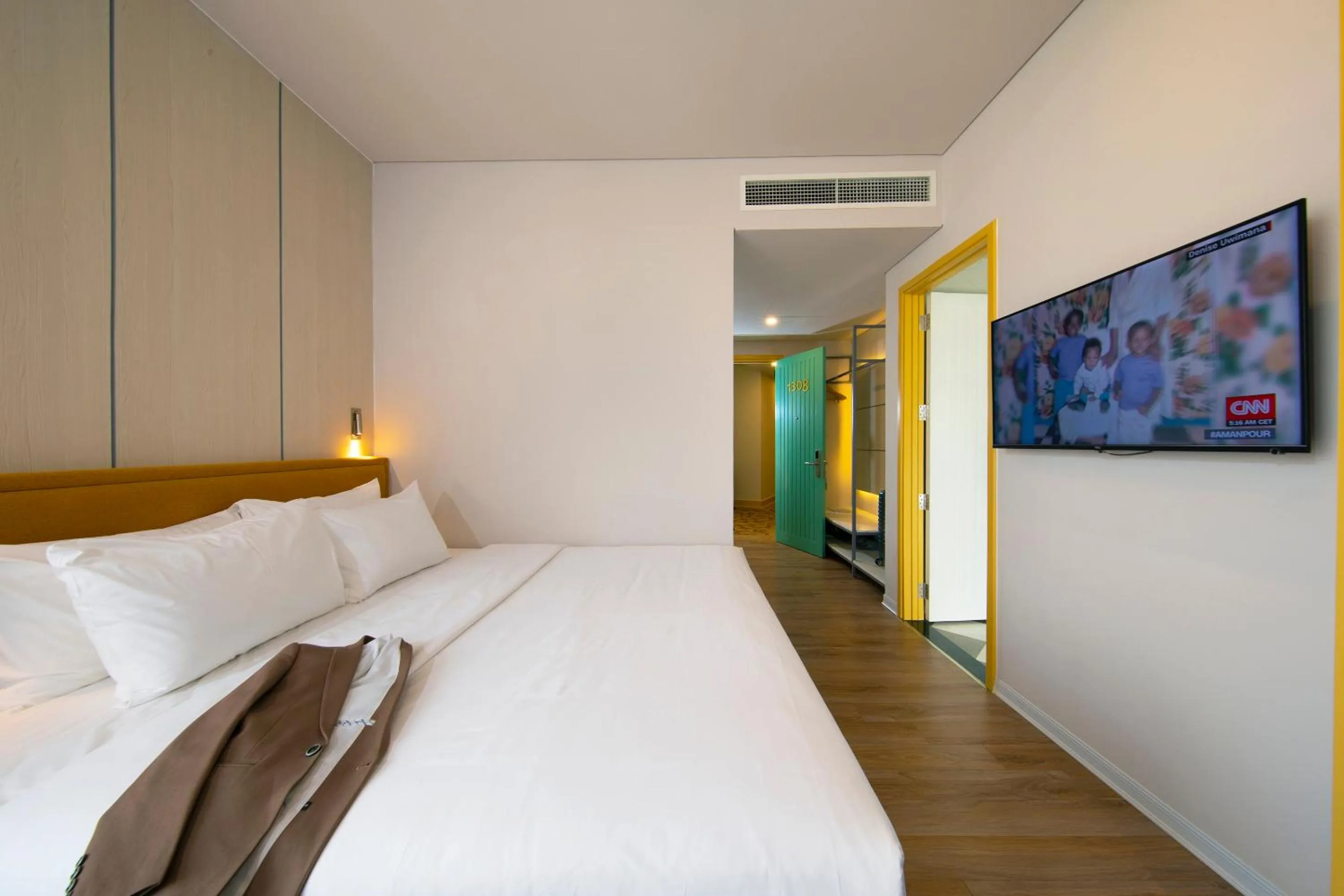 Communal lounge/ TV room, Bed in Grand Citiview Da Nang Hotel