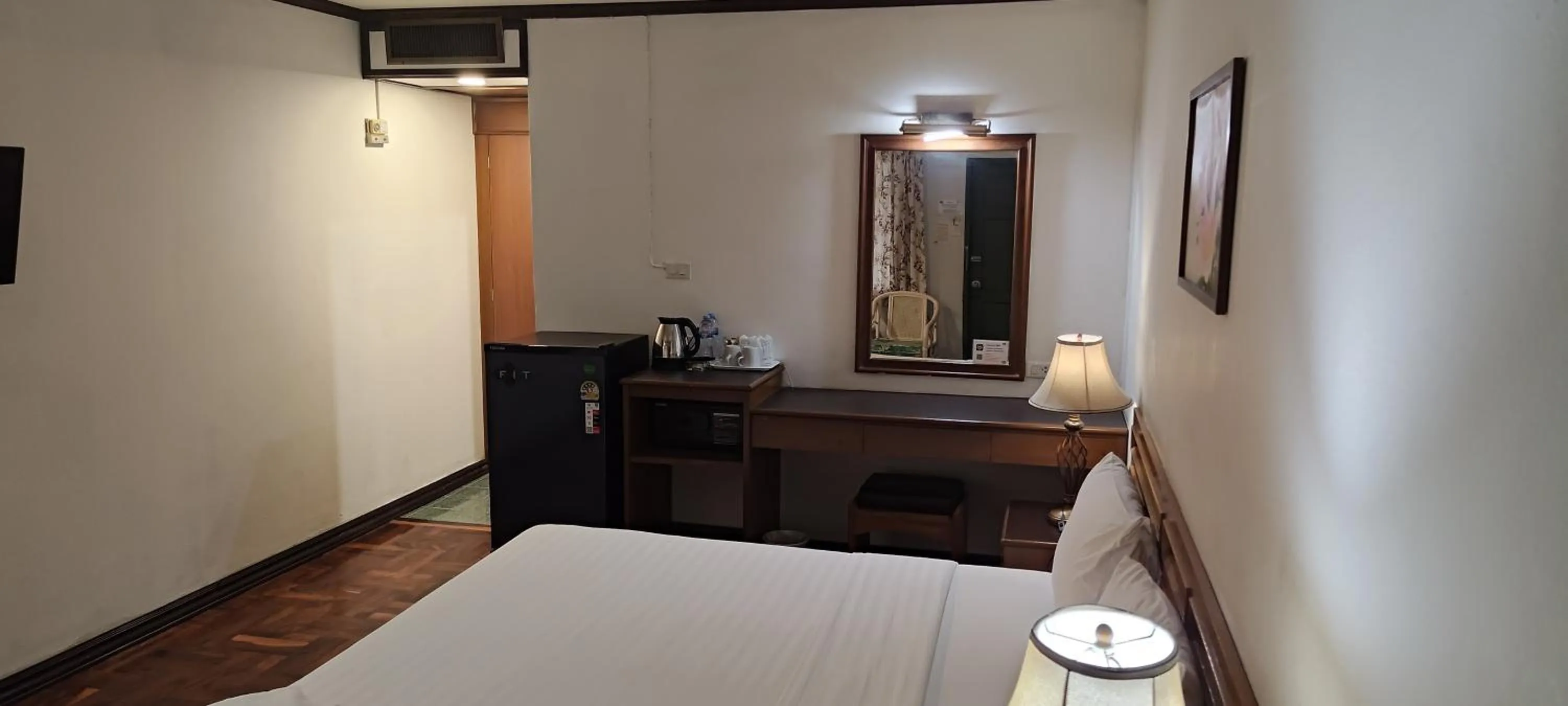 Bed in Puangpen Villa Hotel