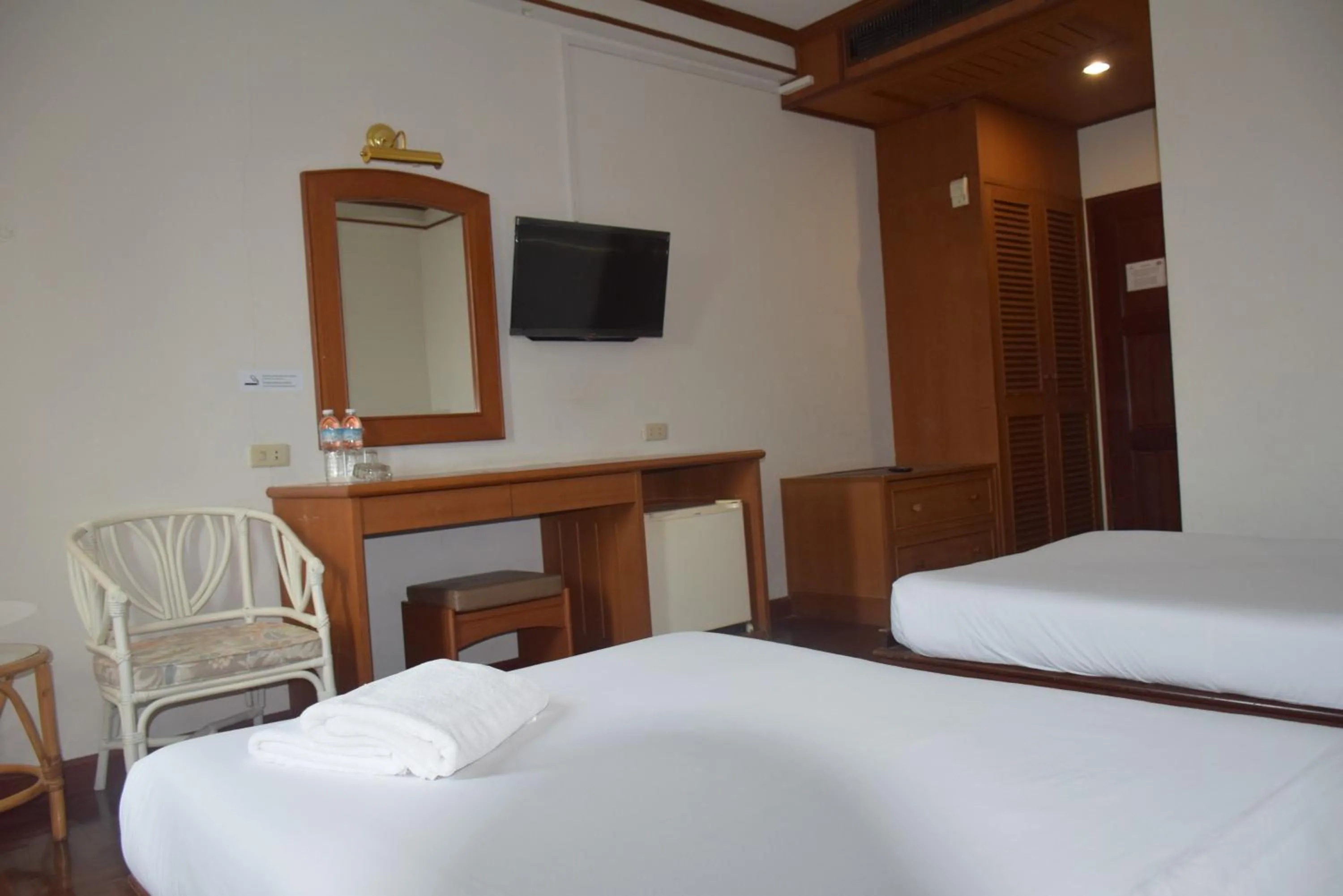 Bed in Puangpen Villa Hotel