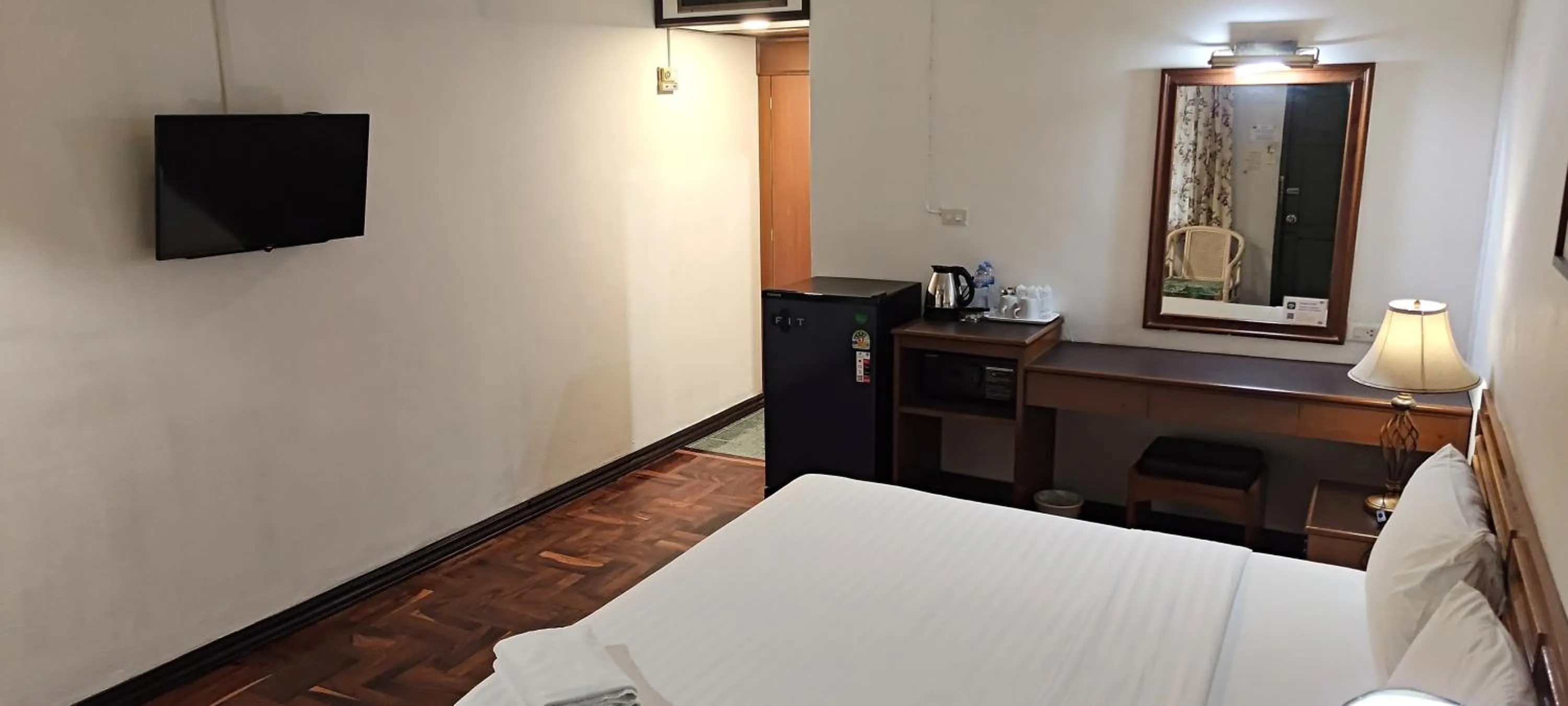 Bed in Puangpen Villa Hotel