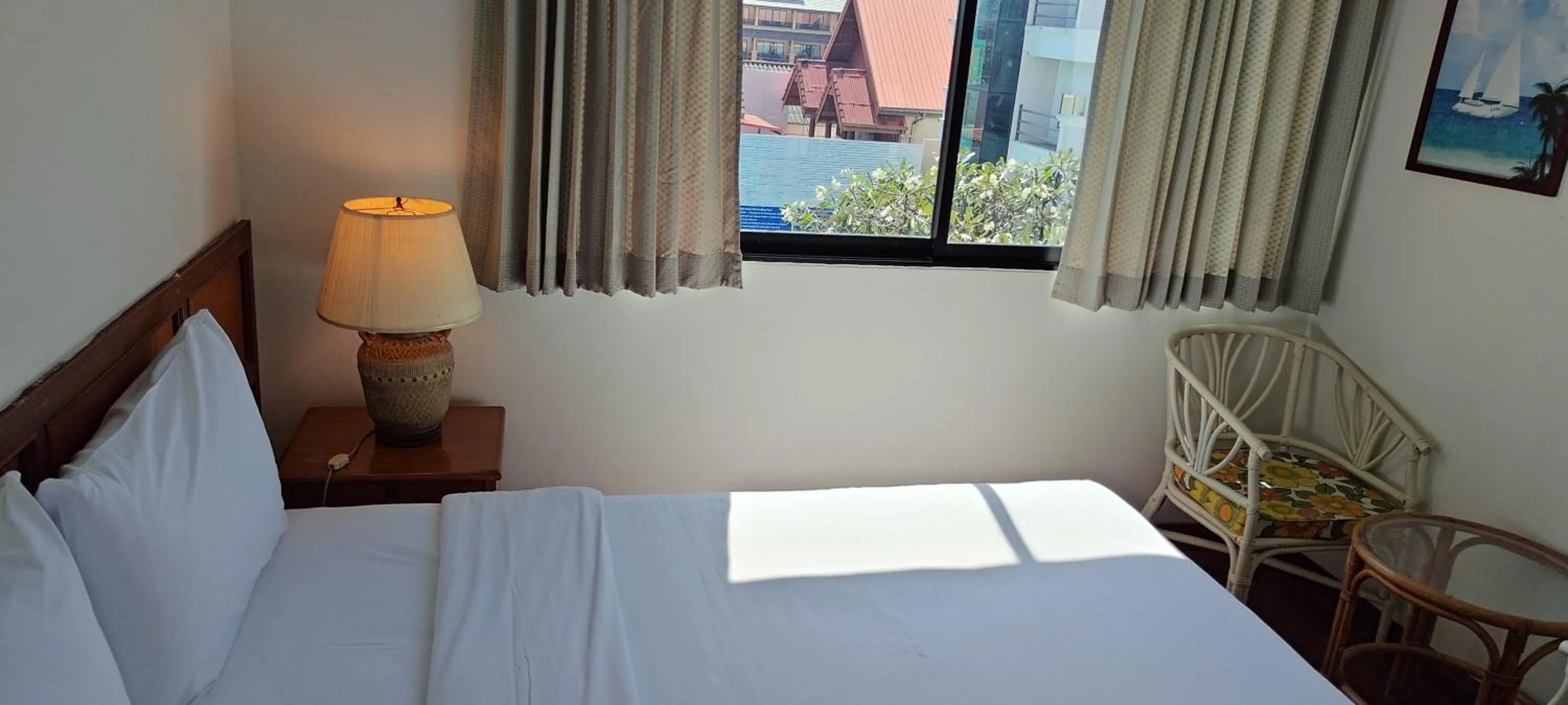 Bed in Puangpen Villa Hotel