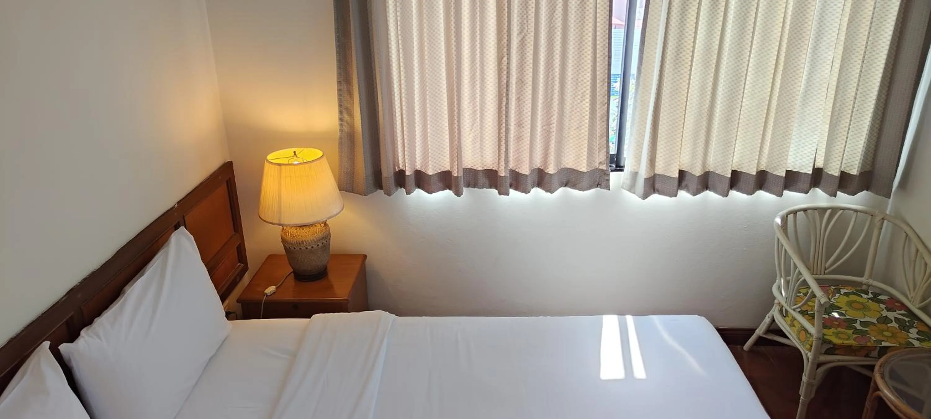 Bed in Puangpen Villa Hotel