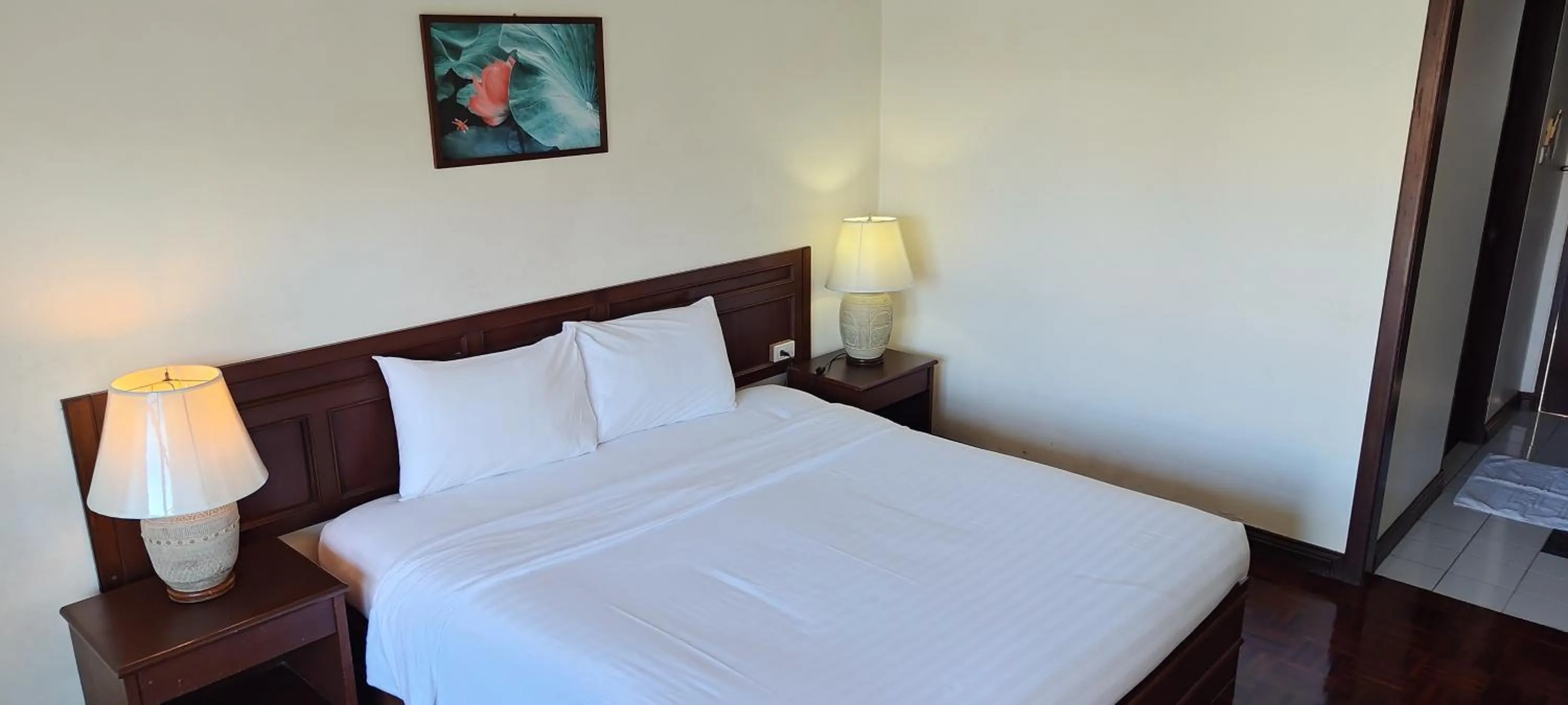 Bed in Puangpen Villa Hotel