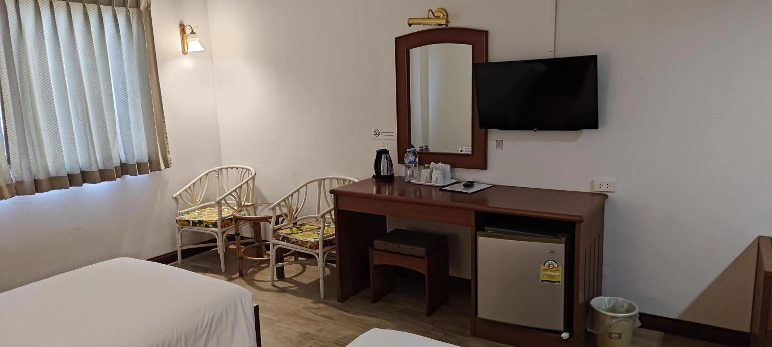 Bed in Puangpen Villa Hotel