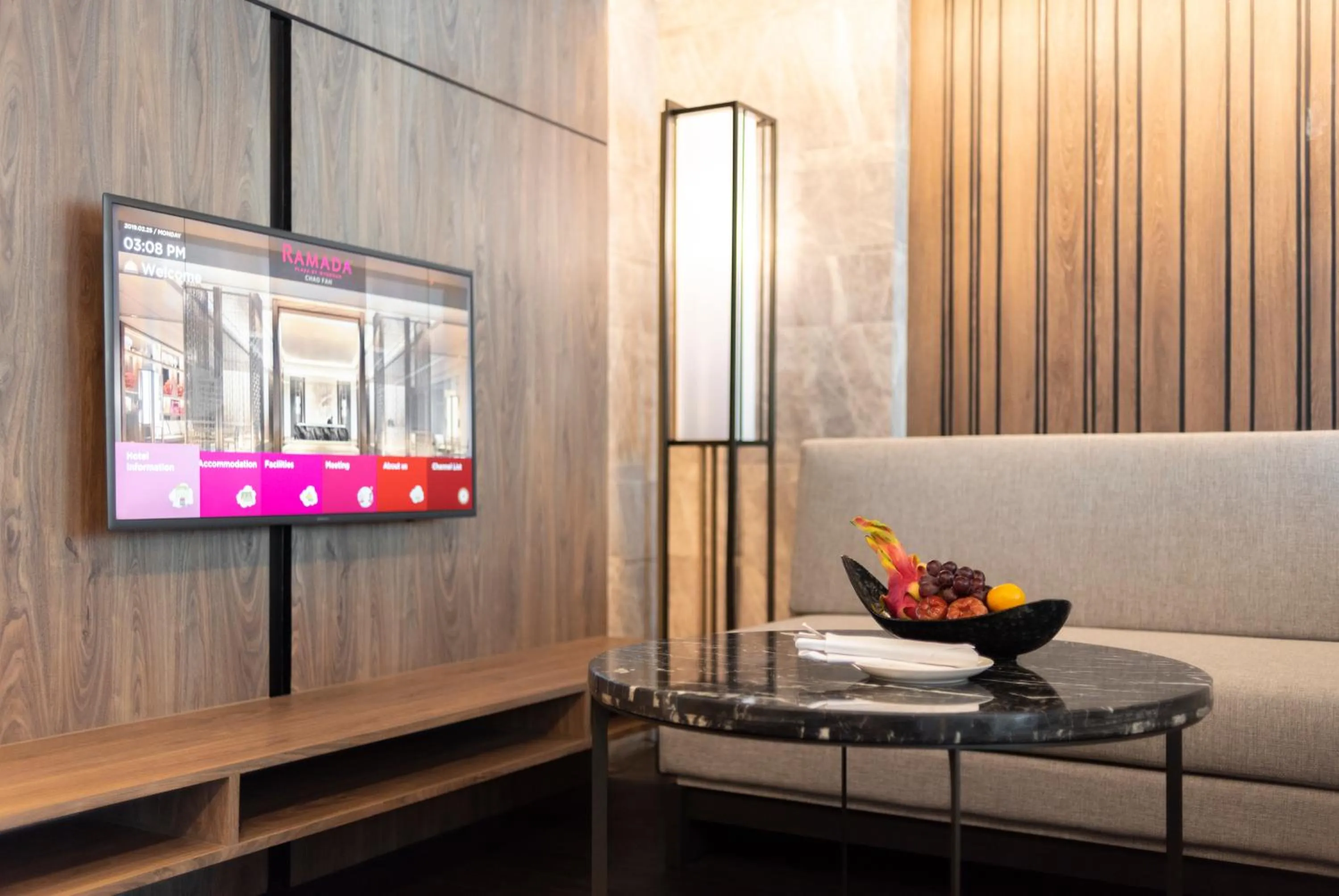 Living room in Ramada Plaza by Wyndham Chao Fah Phuket