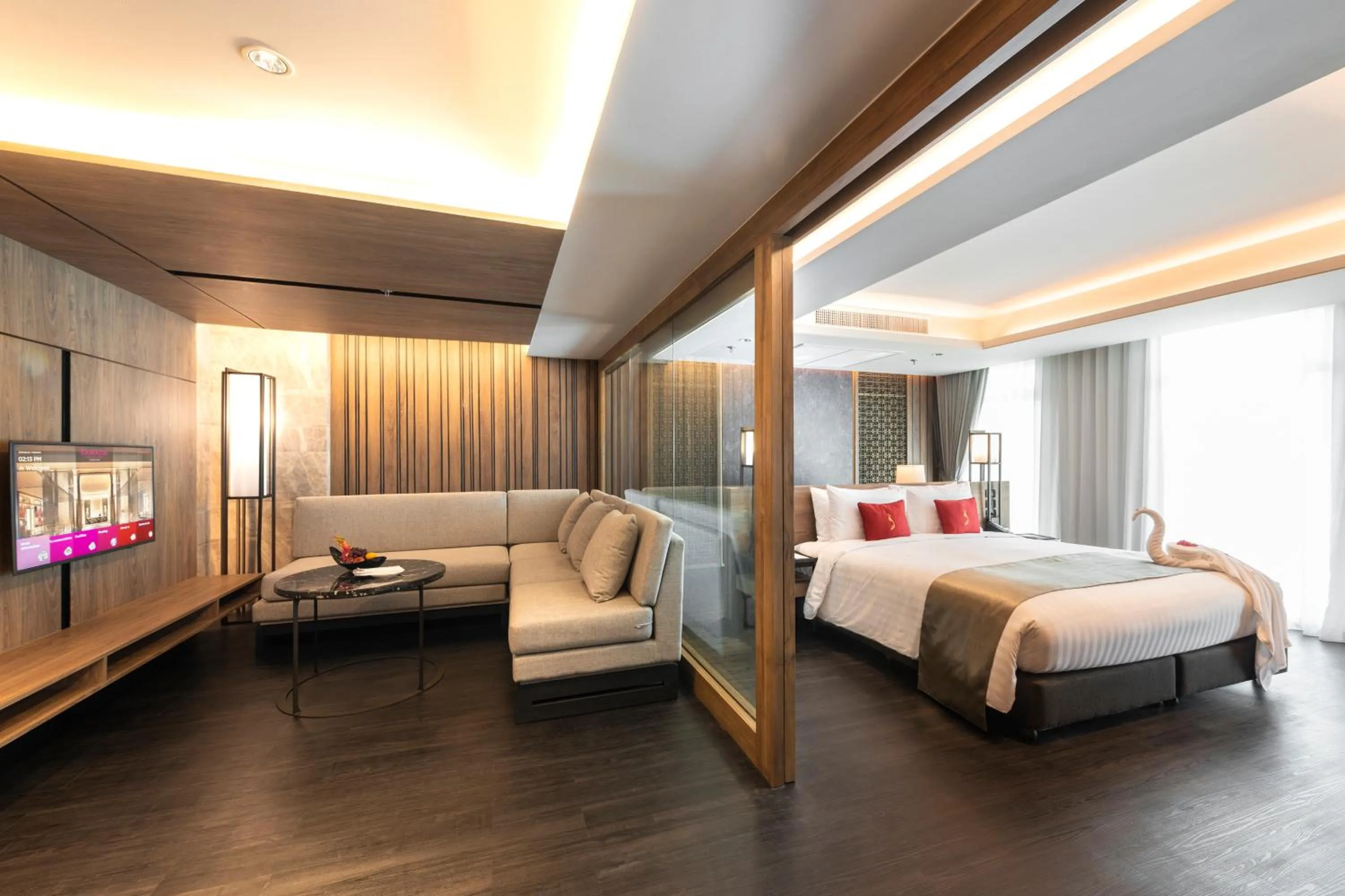 Living room, Bed in Ramada Plaza by Wyndham Chao Fah Phuket