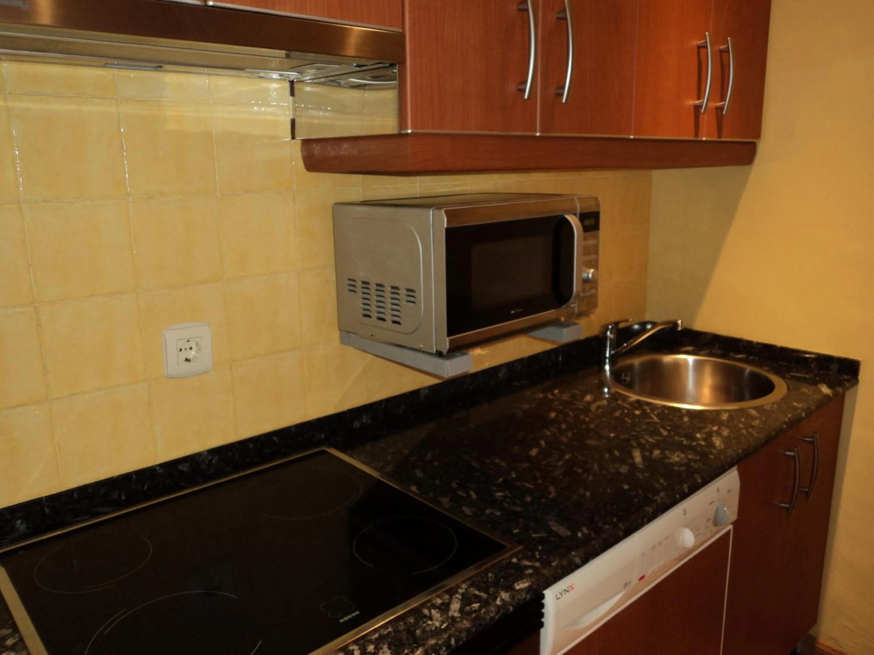 Kitchen or kitchenette in Apartamentos Casa Rosendo