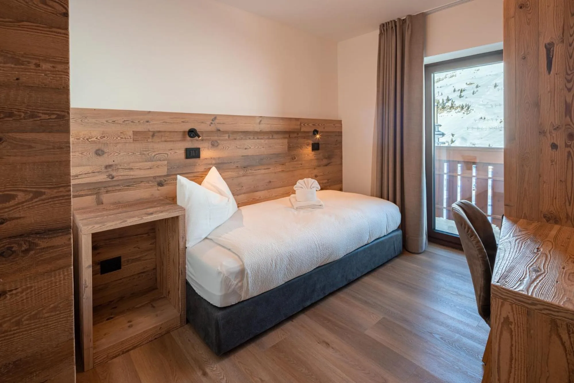 Bed in Albergo Vezzana