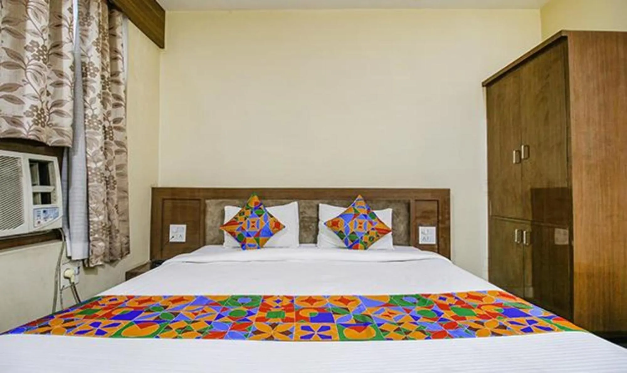 Bed in FabHotel Silver Inn I