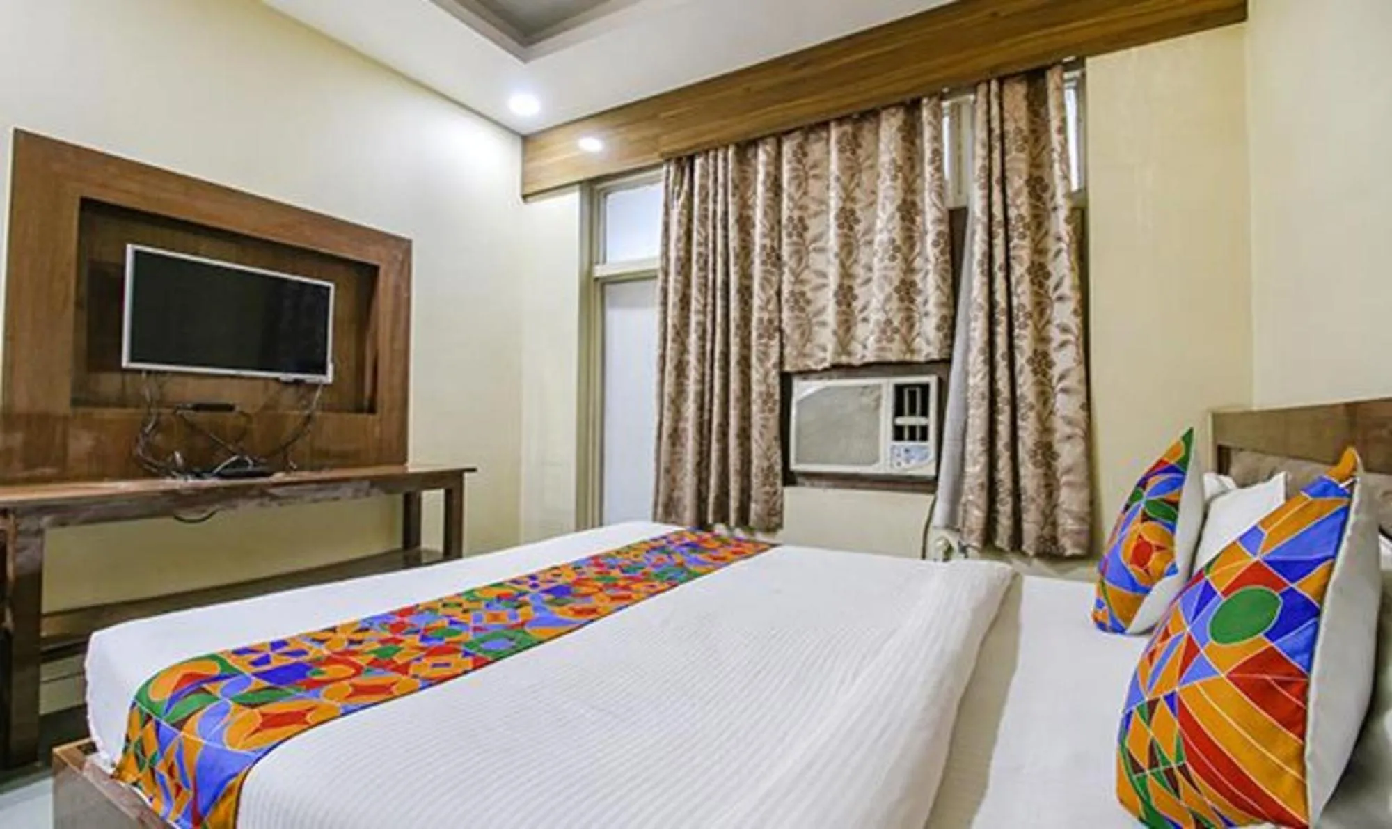 Bed in FabHotel Silver Inn I