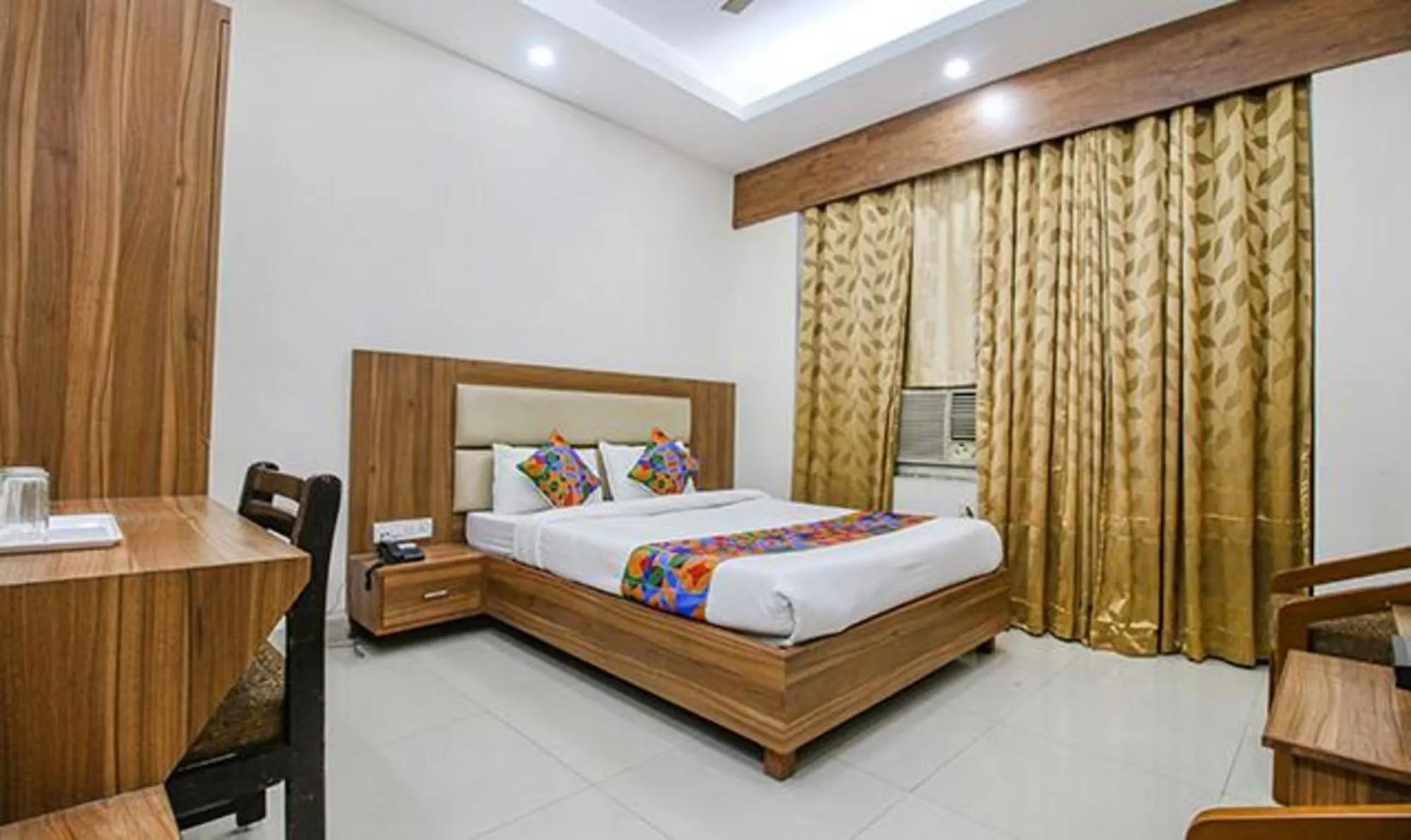 Bed in FabHotel Silver Inn I