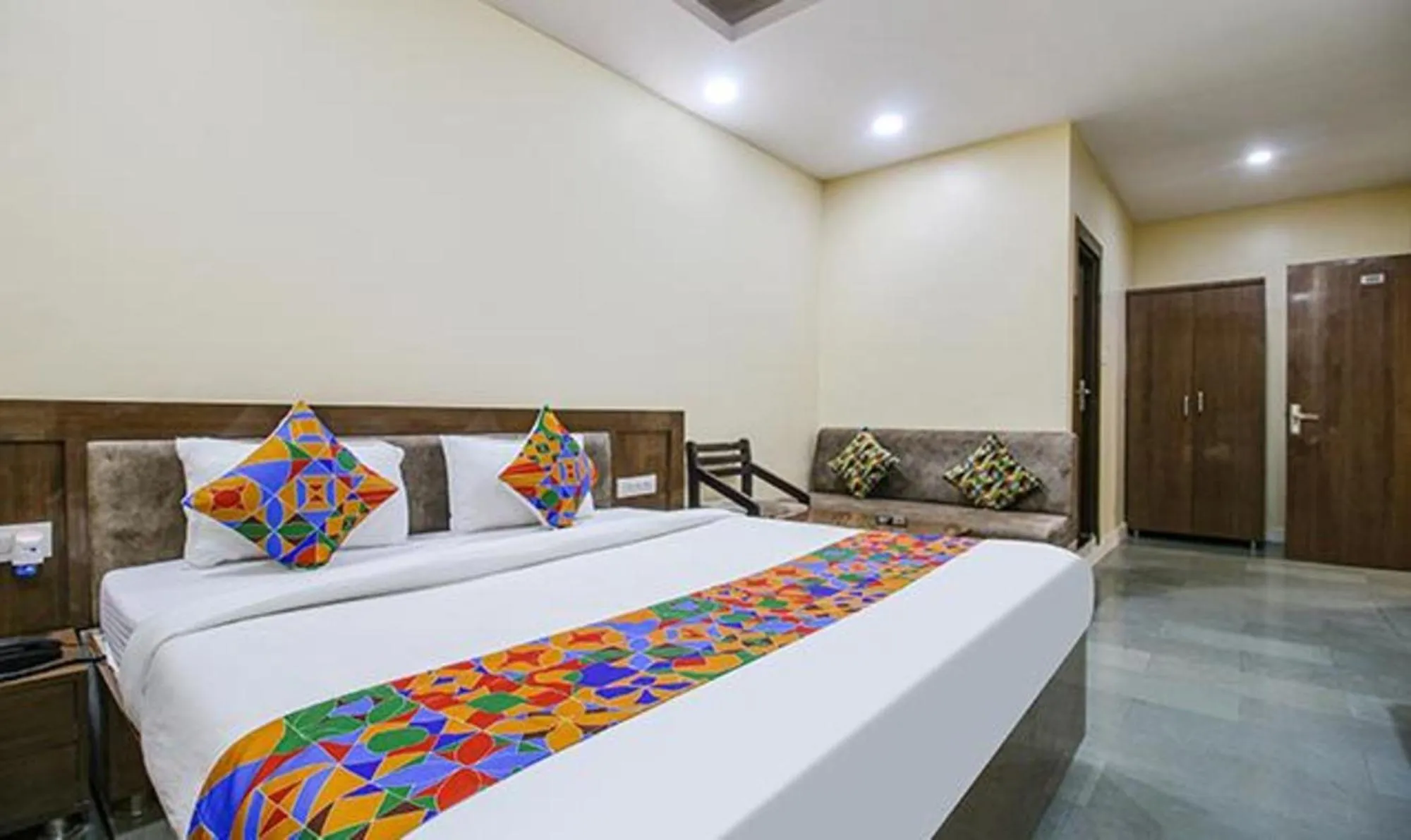 Bed in FabHotel Silver Inn I