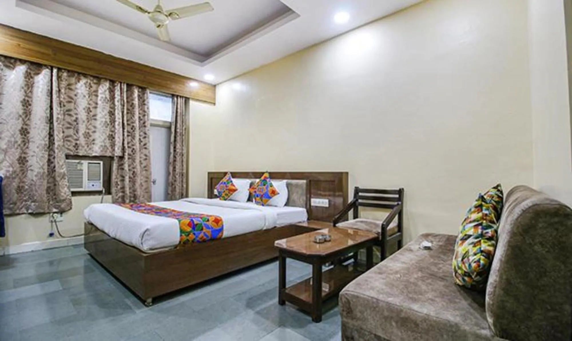 Bed in FabHotel Silver Inn I