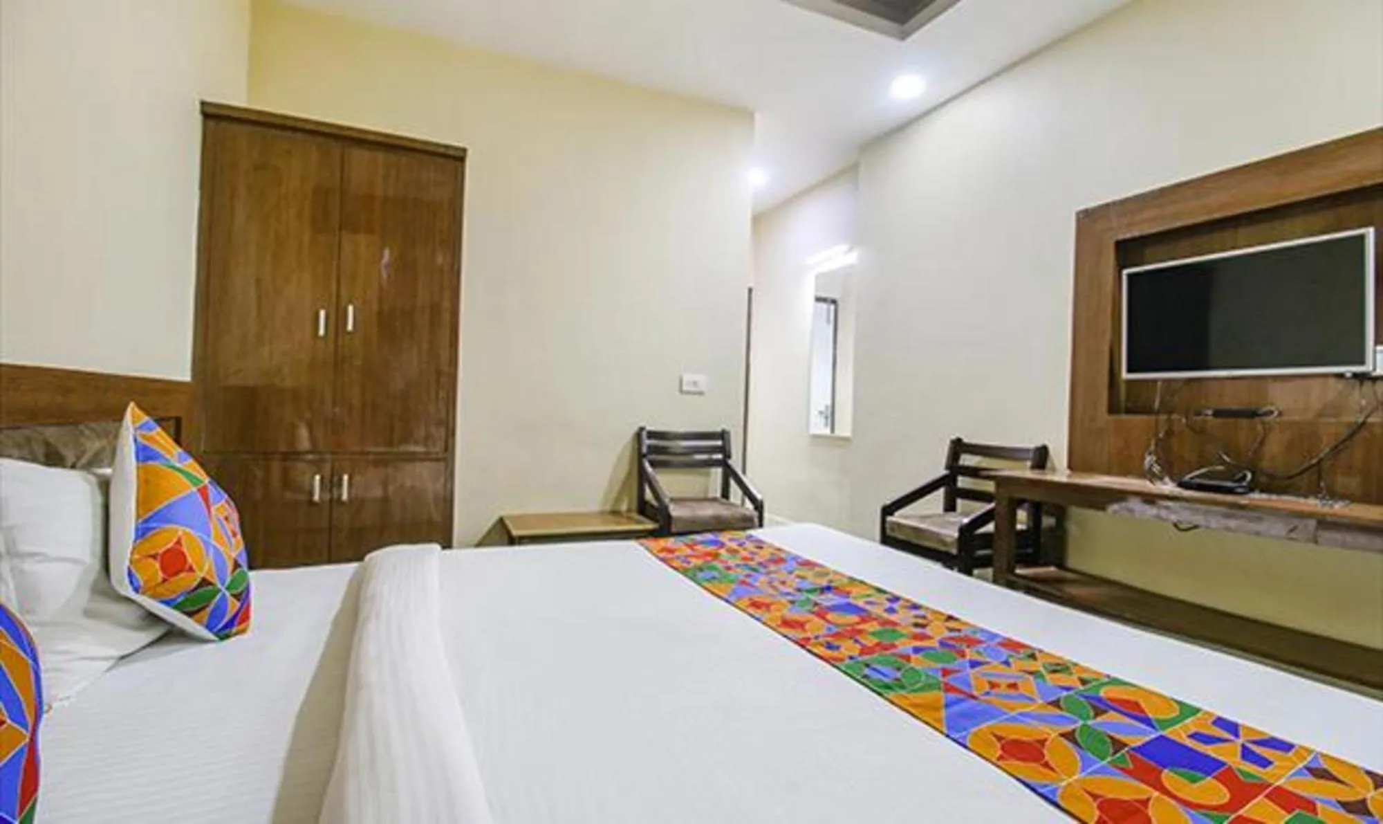 Bed in FabHotel Silver Inn I