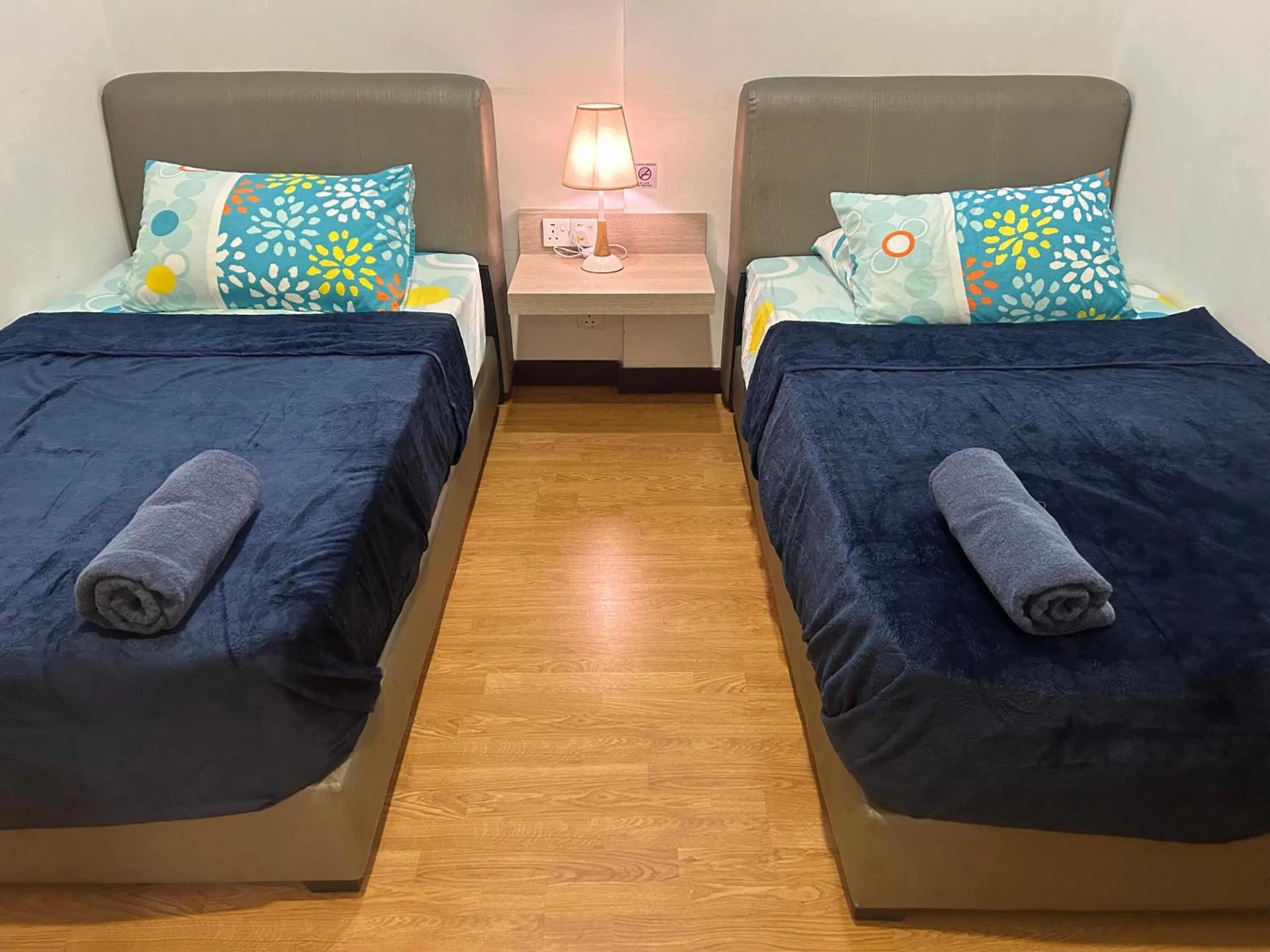 Bed in Imperial Suites Apartments