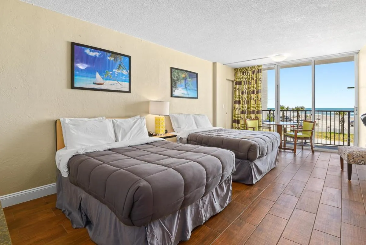 Bed in Cove Motel Oceanfront