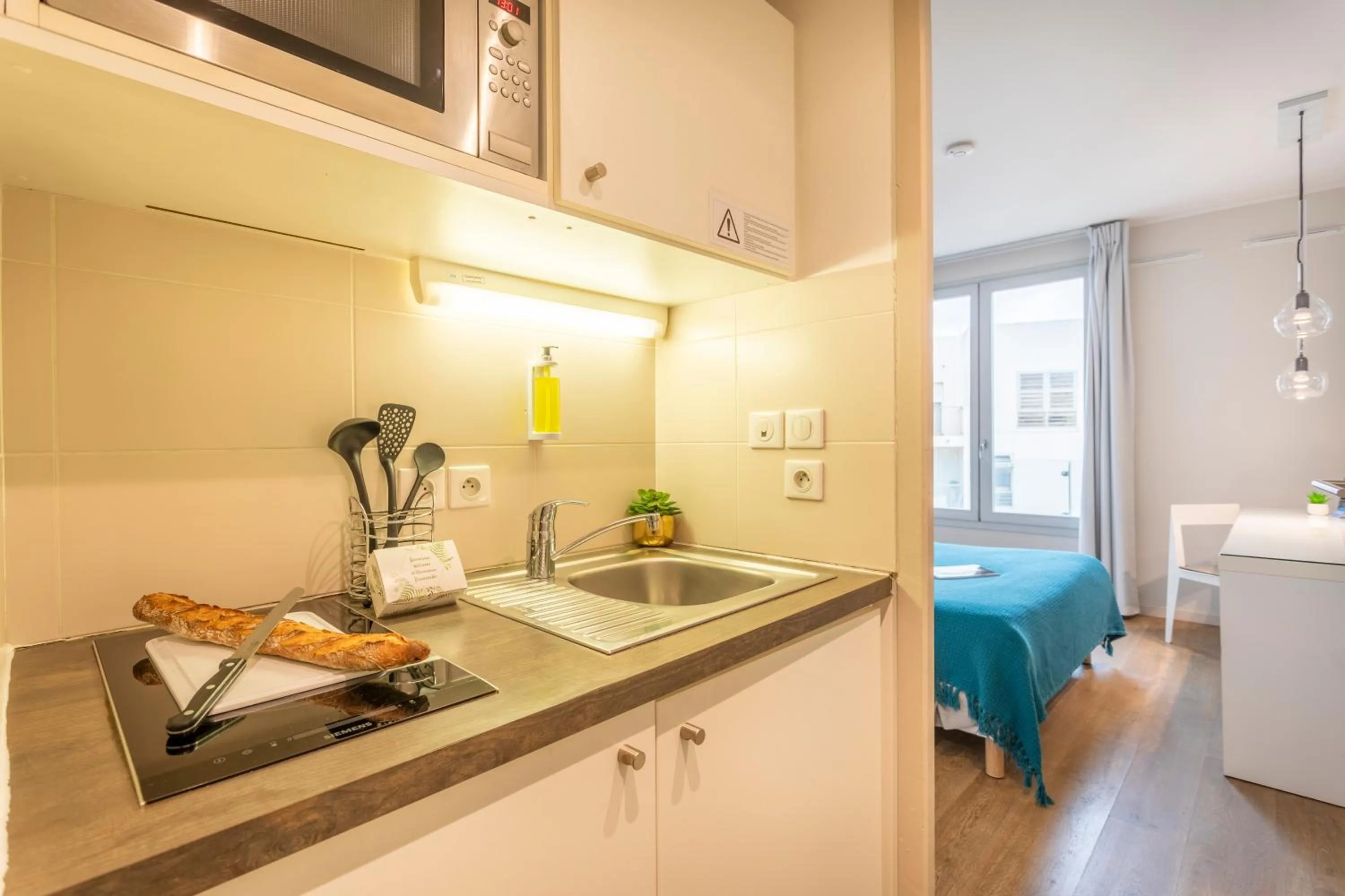 Kitchen or kitchenette in Zenitude Hôtel Résidences Marseille Saint-Charles