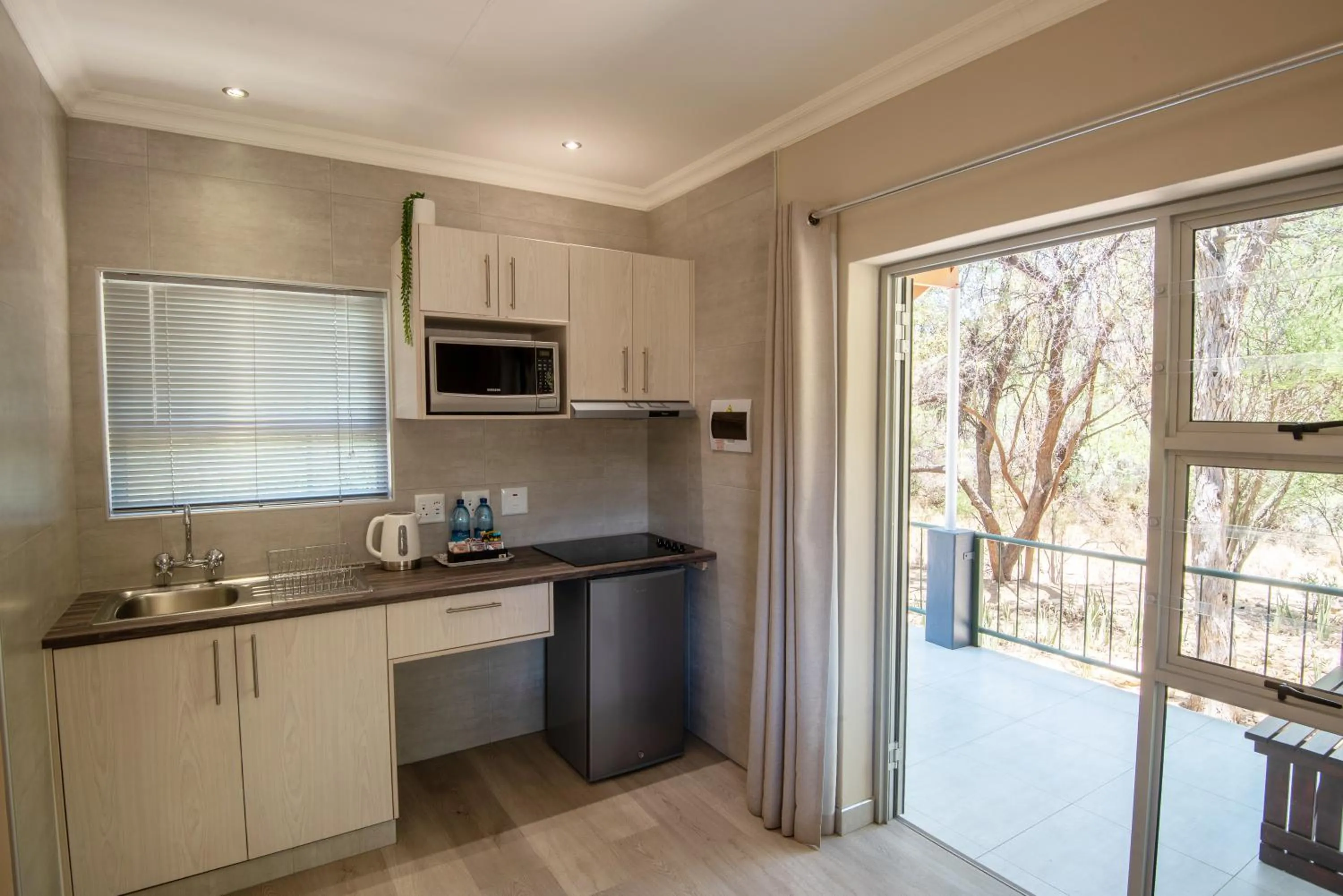 Kitchen or kitchenette in Arebbusch Travel Lodge