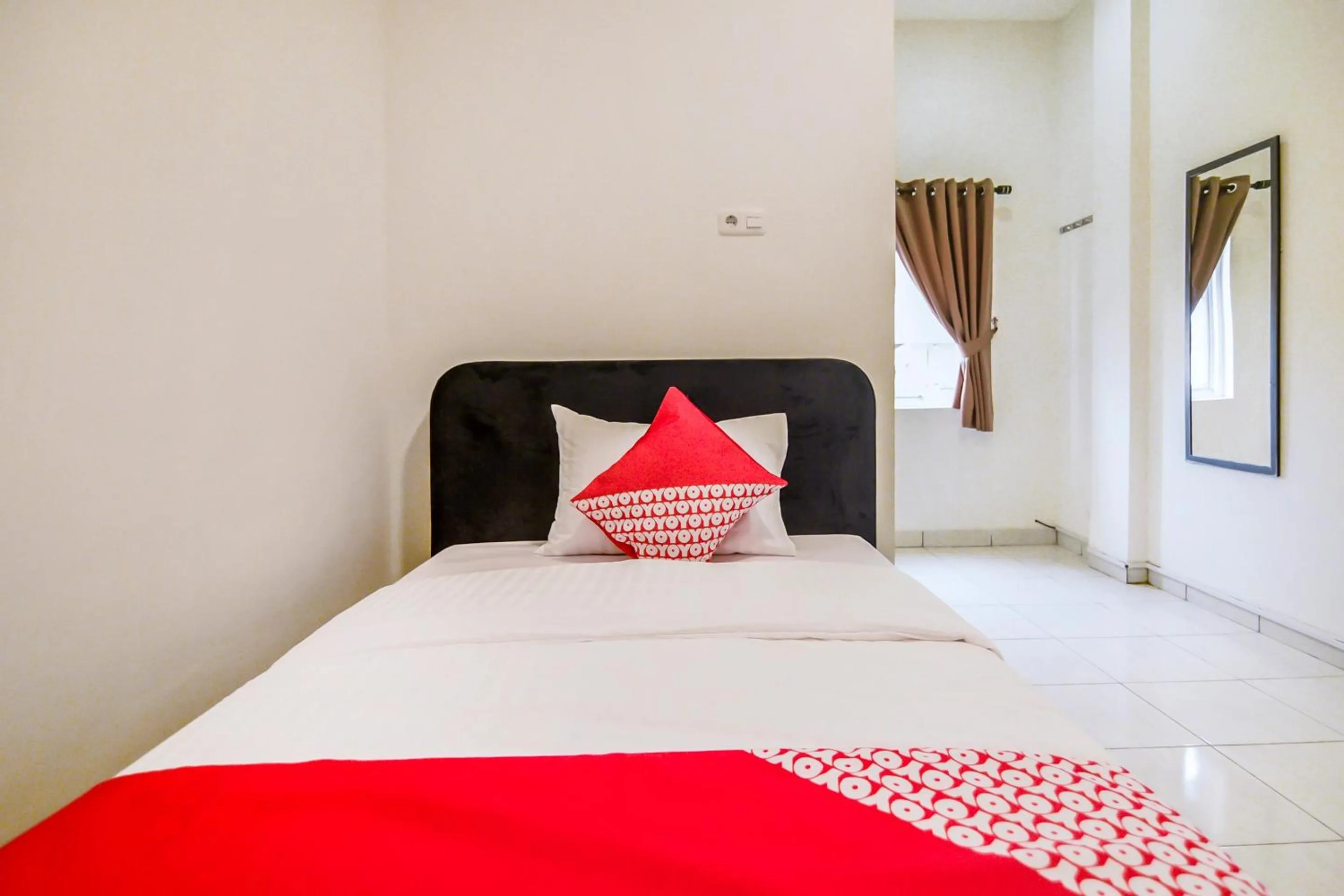 Bedroom in OYO 183 The Pipe House