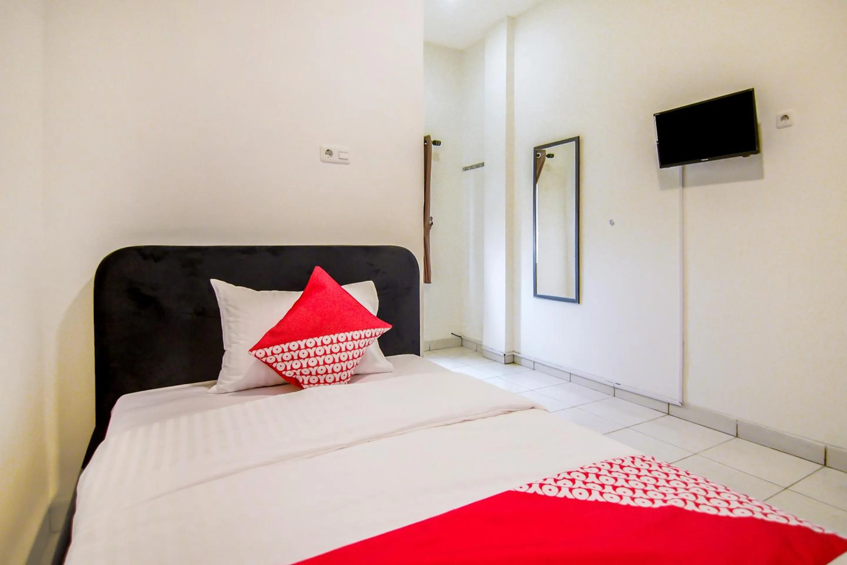 Bedroom in OYO 183 The Pipe House