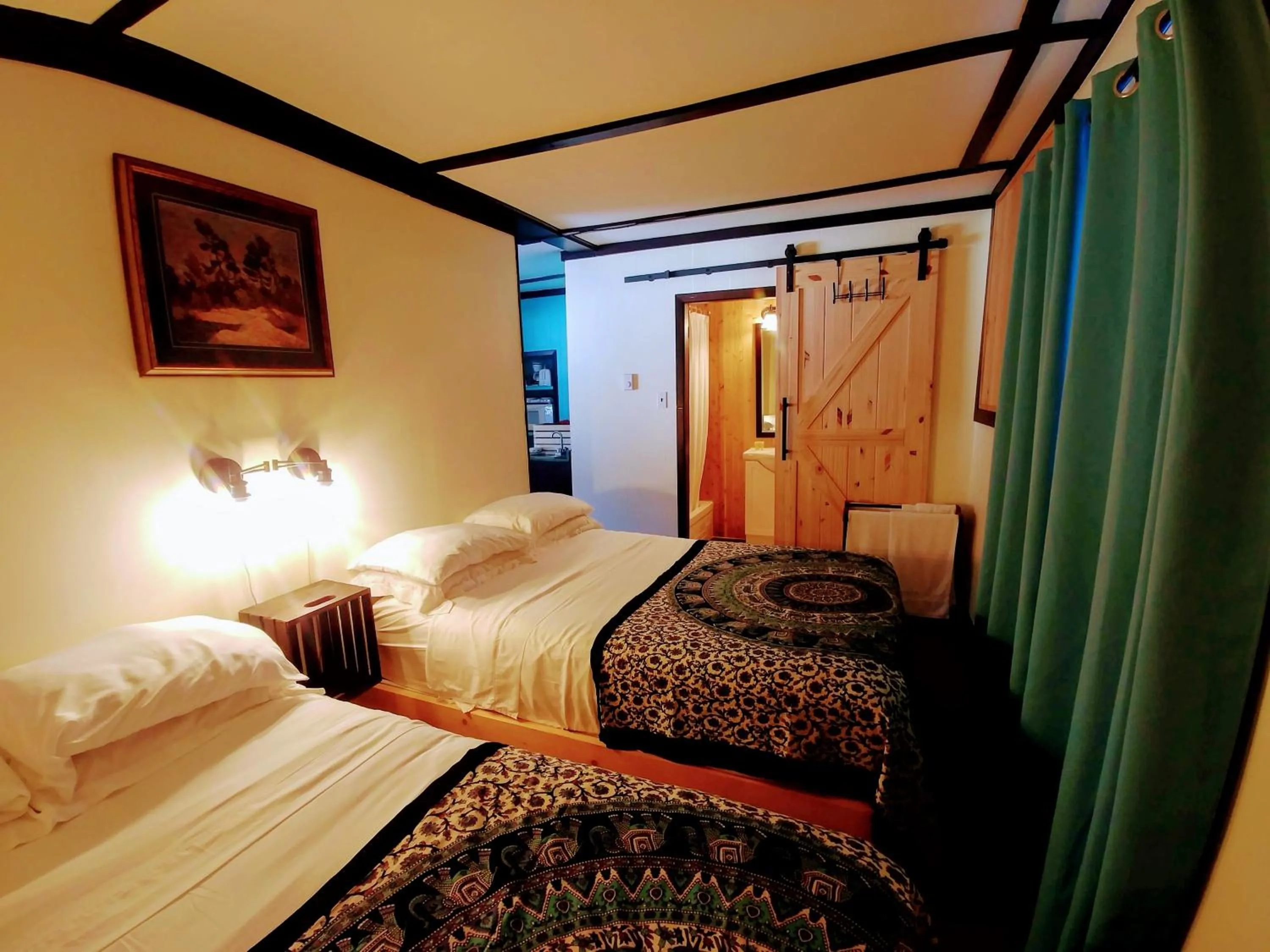 Bed in Dwight Riverside Inn