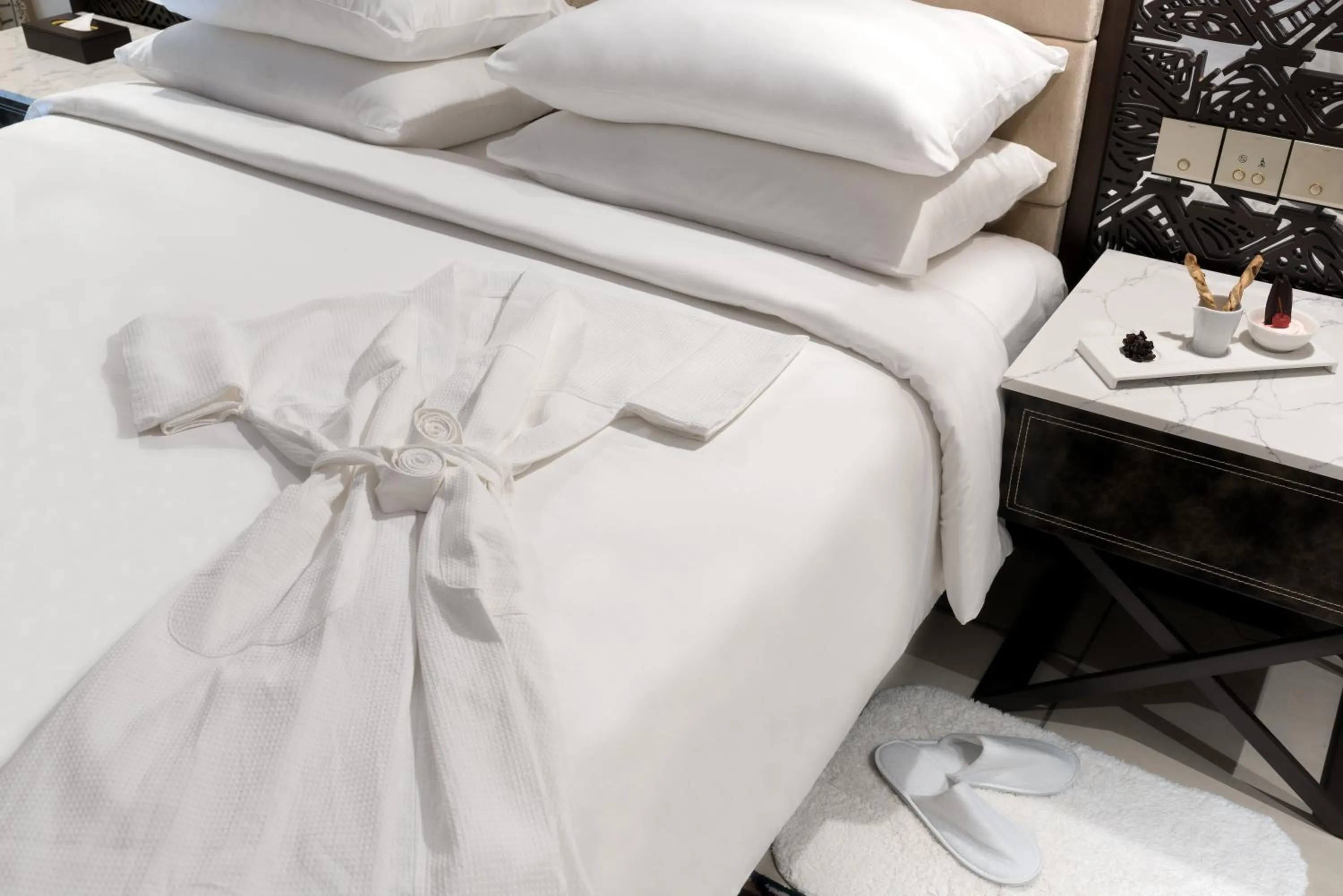 Bed in Neelkanth Sarovar Premiere