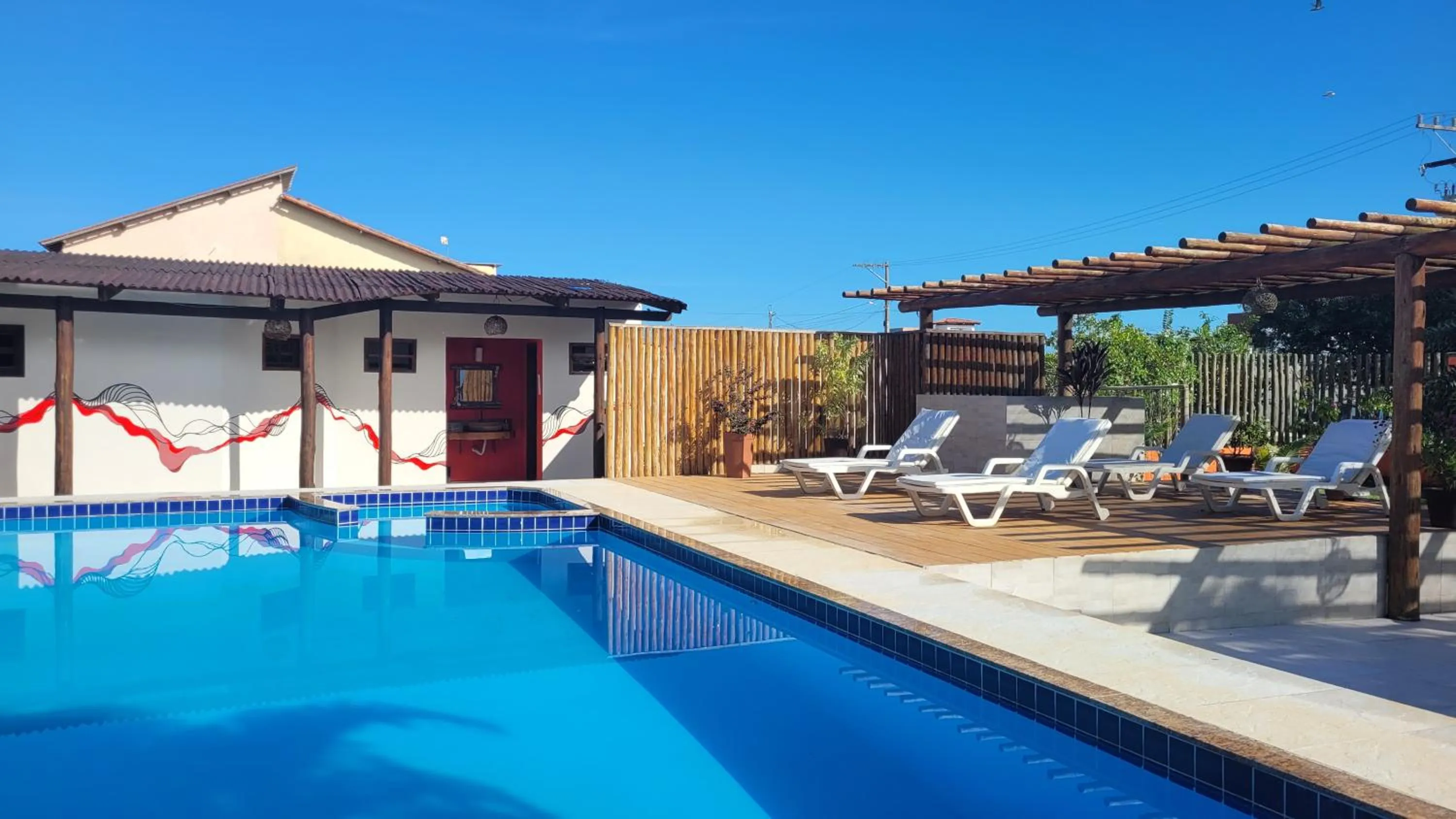 Swimming pool in Pousada Coral de Fogo