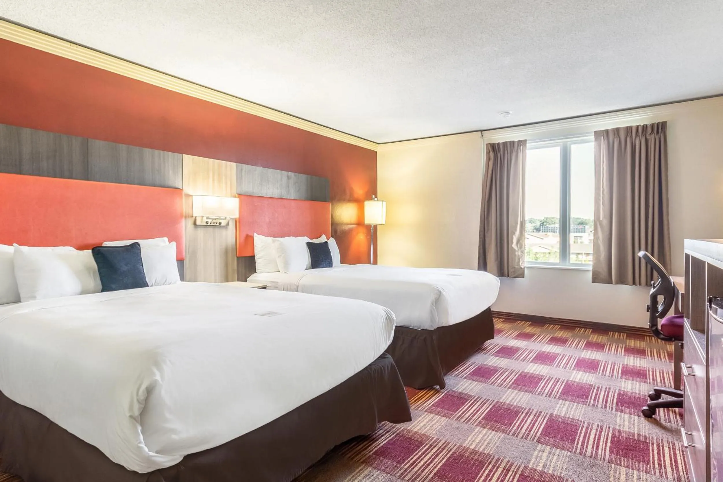 Bed in Countryside Suites Kansas City Independence I-70 East Sports Complex Hotel