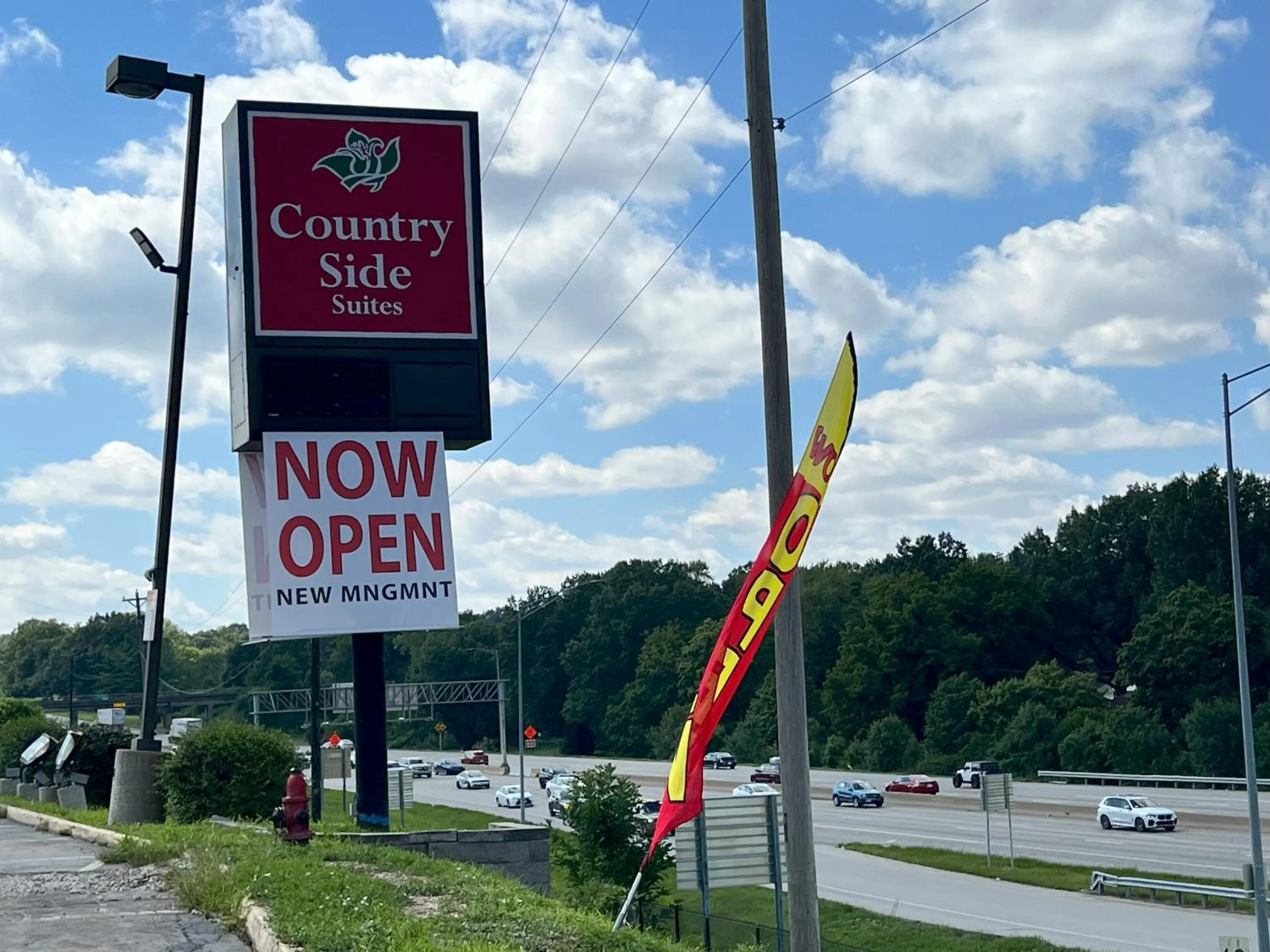 Property logo or sign in Countryside Suites Kansas City Independence I-70 East Sports Complex Hotel