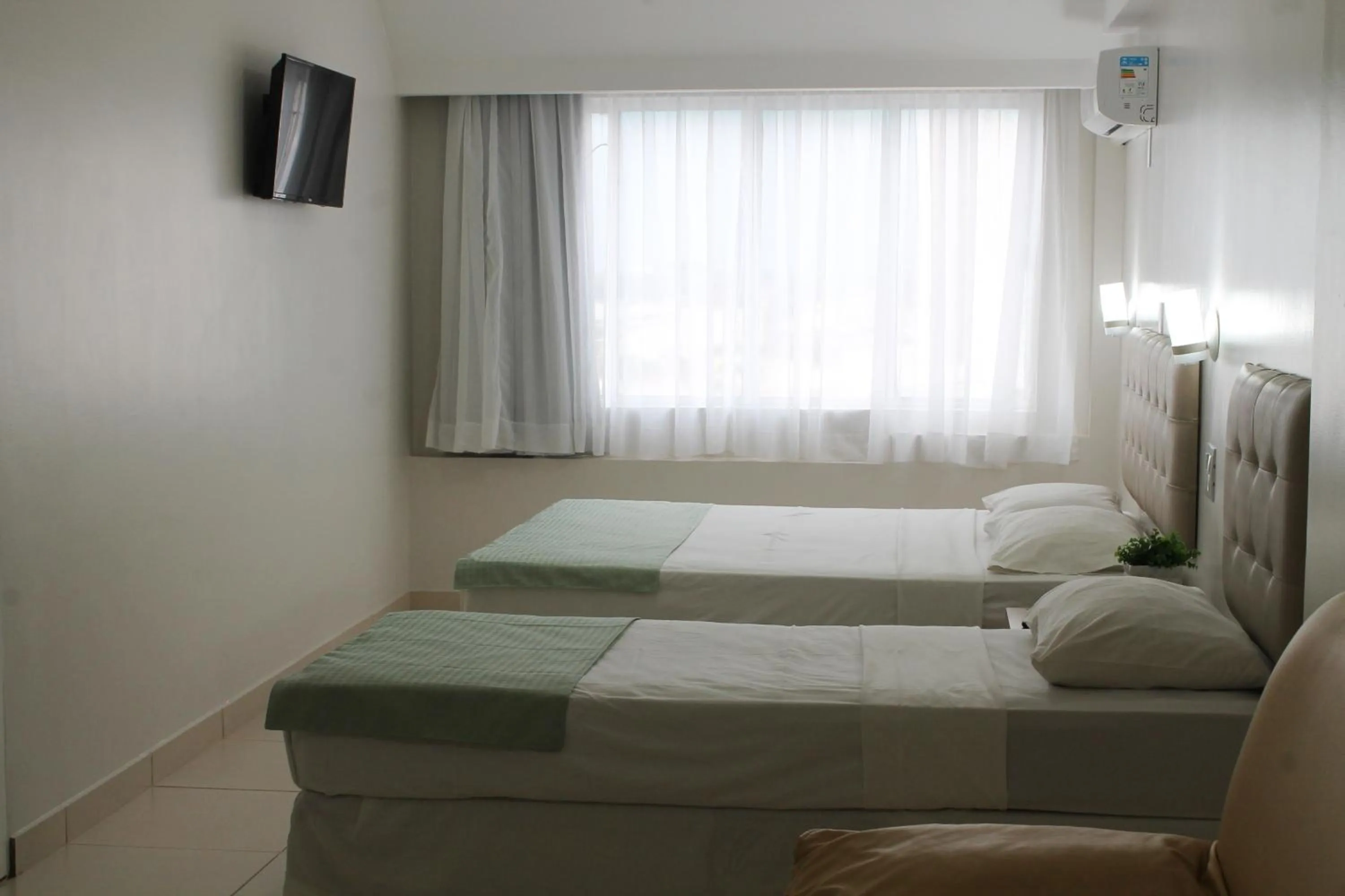 Bed in Hotel Doral Apucarana